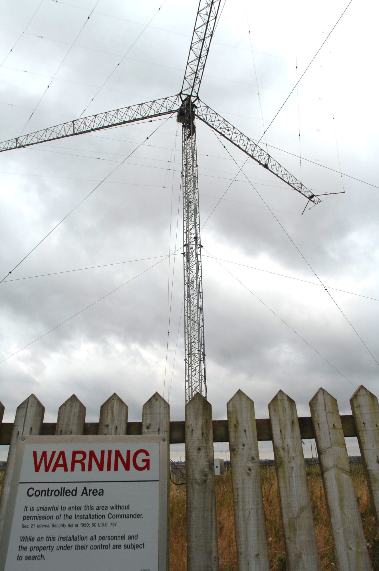 U.S. Air Force Staff Sgt. Scot Craig, 1st Communications Maintenance Squadron, loosens a guywire, which holds tension through tie-down points connected to a radio tower. Sergeant Craig is a member of the Cable and Antenna Theater Maintenance Team who travel routinely throughout Europe maintaining the communications capability force across the Atlantic and on into the European Route. (U.S. Air Force photo by Tech. Sgt. Michael Voss)