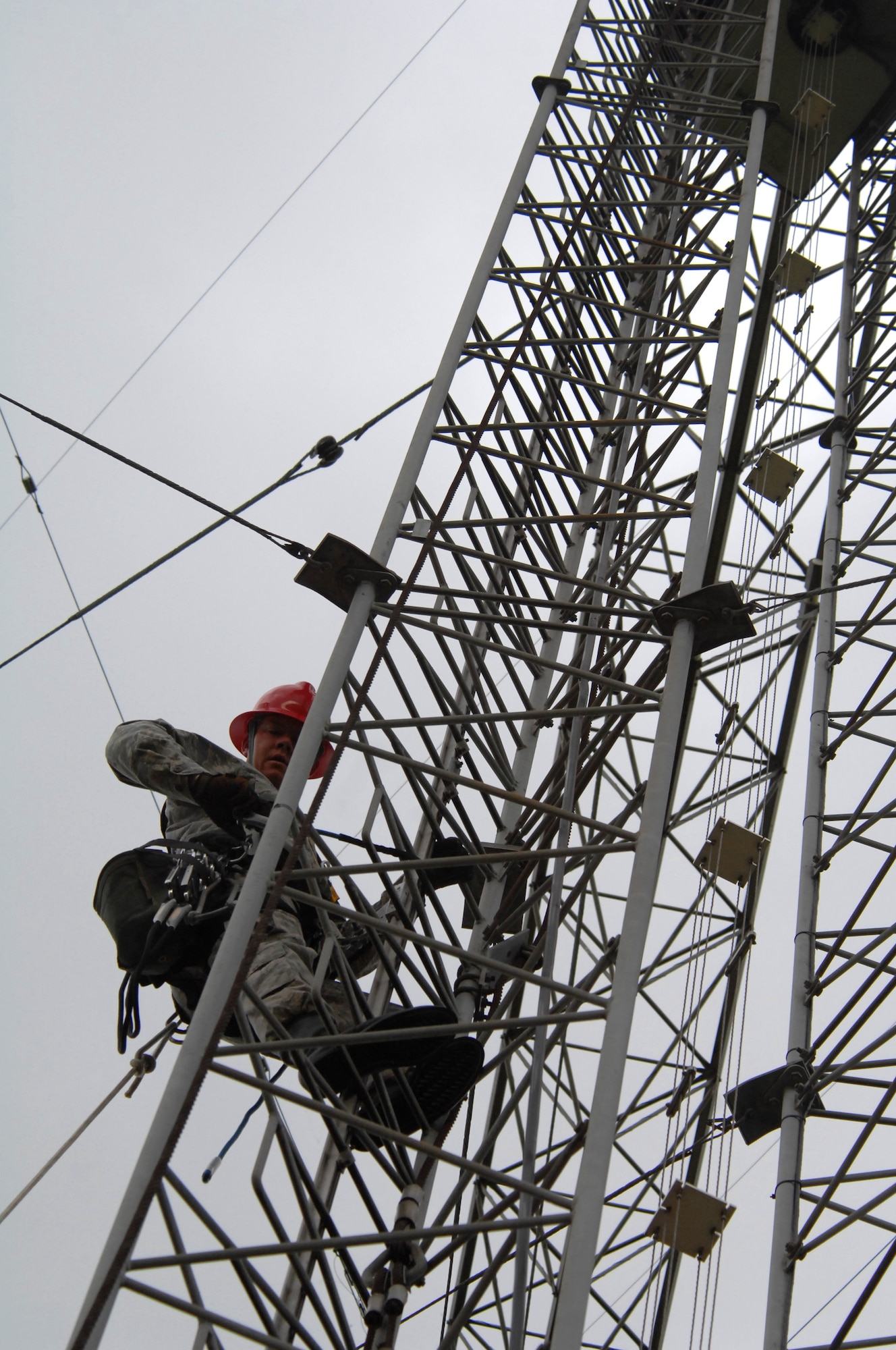 U.S. Air Force Tech. Sgt. Tim Daniel, 1st Communications Maintenance Squadron, performs a preventative maintenance inspection of a radio tower. Sergeant Daniel is a member of the Cable and Antenna Theater Maintenance Team who travel routinely throughout Europe maintaining the communications capability Force across the Atlantic and on into the European Route. (Air Force photo by Tech. Sgt. Michael Voss)