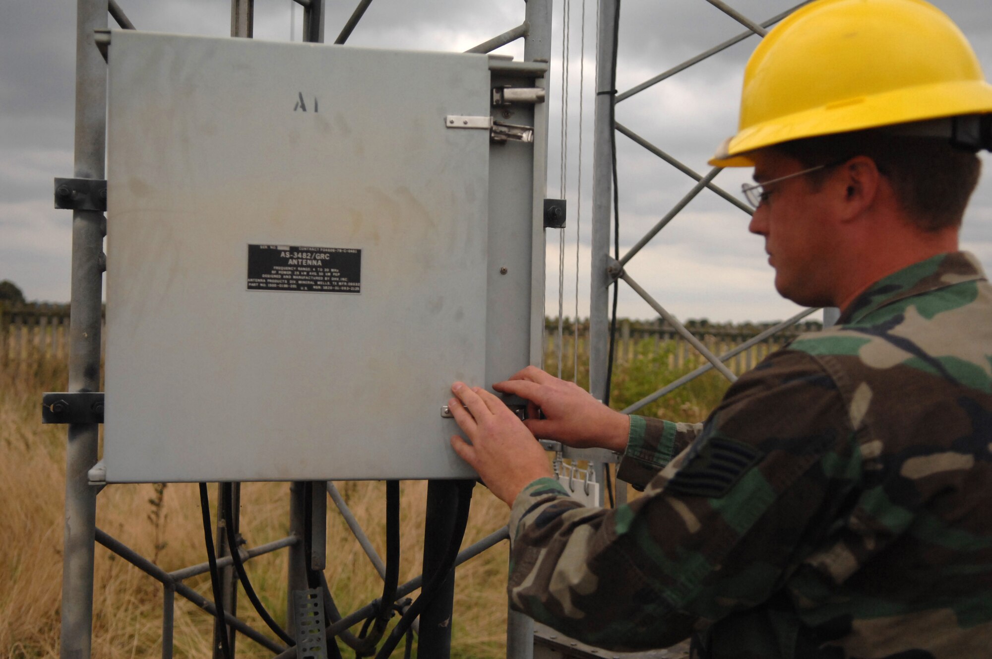 U.S. Air Force Tech. Sgt. Scott Dunbar 1st Communications Maintenance Squadron, accesses the control panel to a radio tower. Sergeant Dunbar is a member of the Cable and Antenna Theater Maintenance Team who travel routinely throughout Europe maintaining the communications capability force across the Atlantic. (U.S. Air Force photo by Tech. Sgt. Michael Voss)