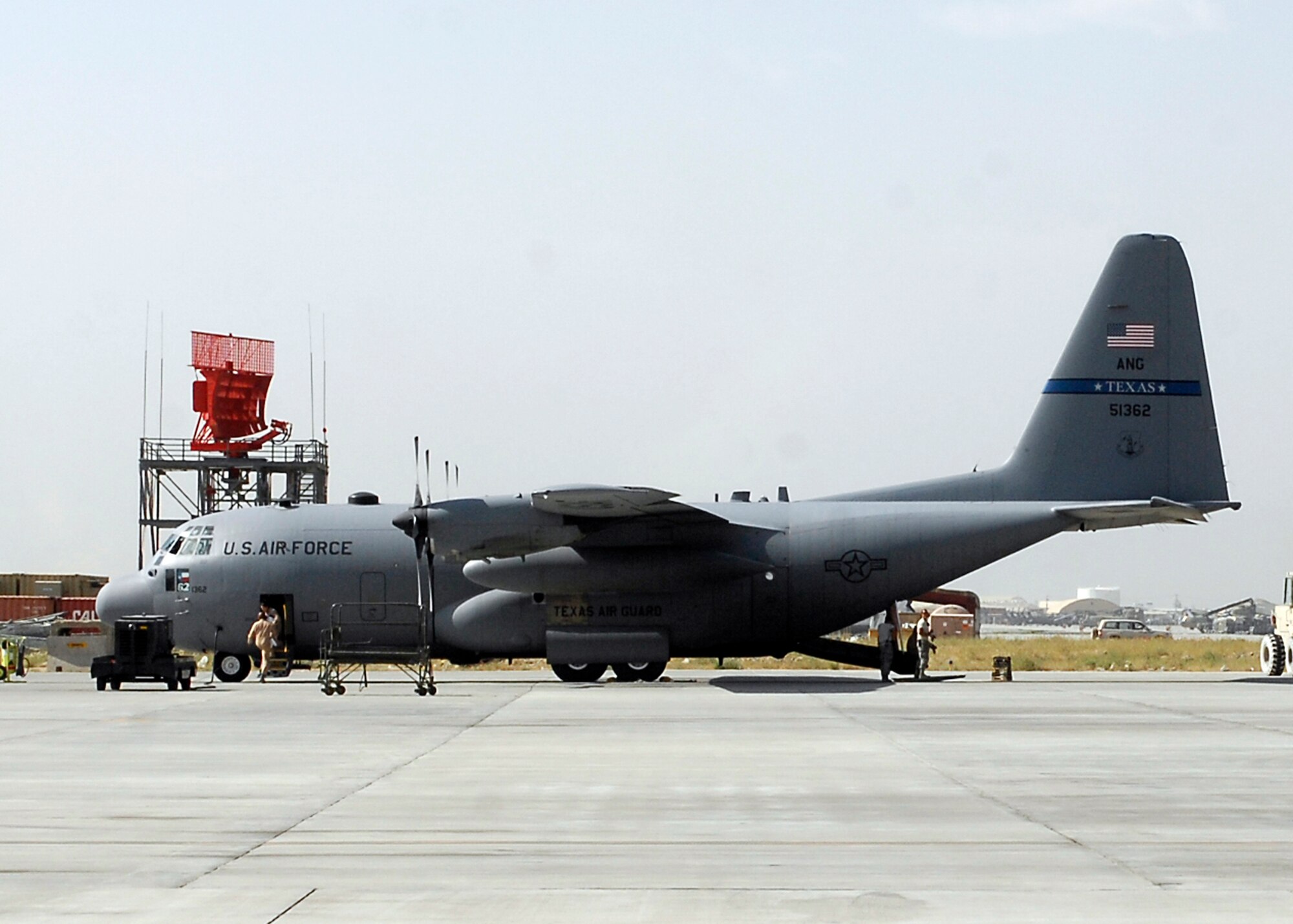 BAGRAM AIRFIELD, Afghanistan -- A C-130 Hercules, from the 136th Airlift Wing in Texas, awaits to take off for a mission in support of Operation Enduring Freedom here, Sept. 21, 2009.  The C-130's maintain a vital role in the overall mission by transporting anything from cargo to personnel and airdropping supplies to Afghan villagers or Coalition forces.  The C-130s are part of the 455th Air Expeditionary Wing's 774th Expeditionary Airlift Squadron.  (U.S. Air Force photo/Senior Airman Felicia Juenke)