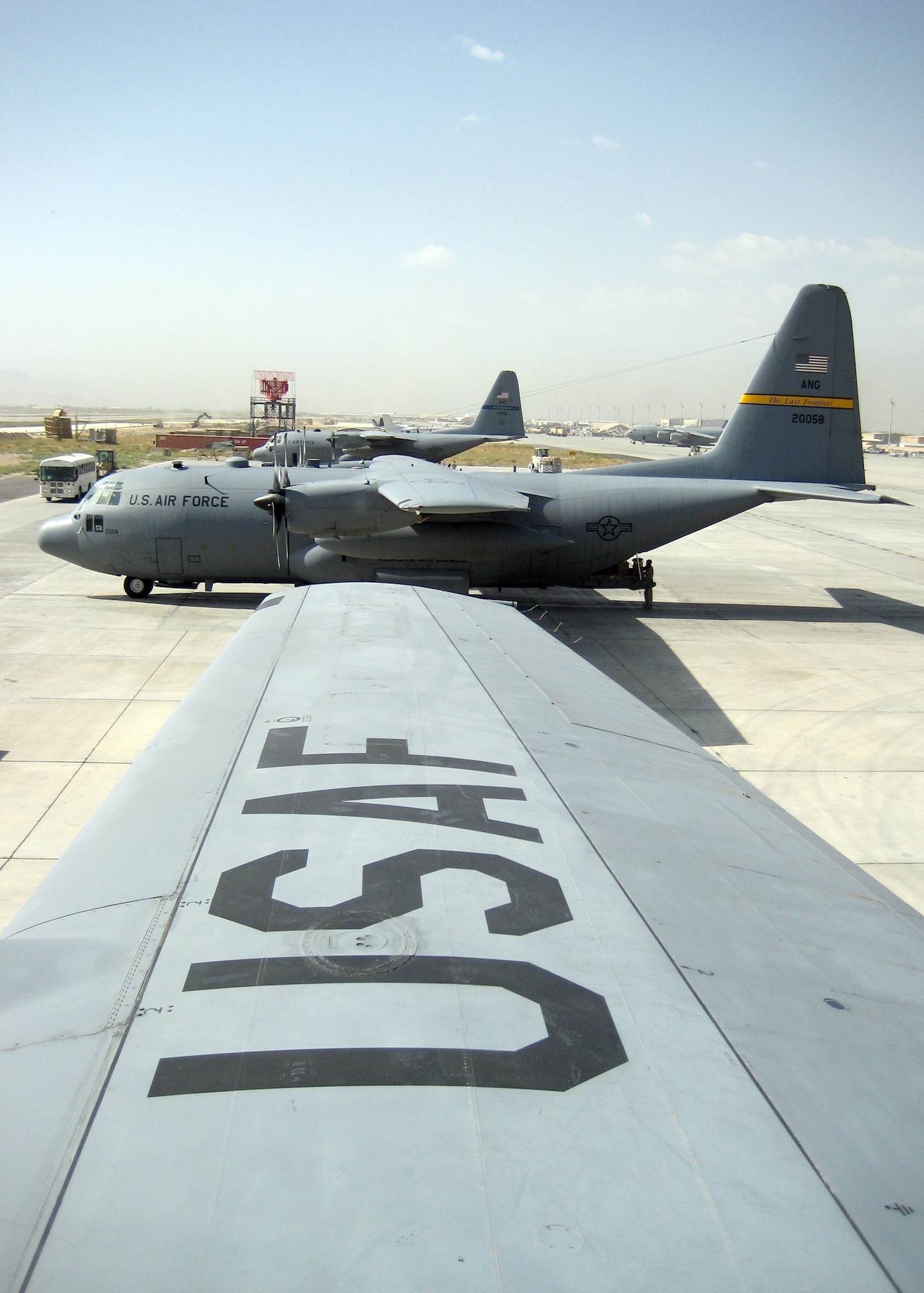 BAGRAM AIRFIELD, Afghanistan -- A C-130 Hercules, deployed from Alaska's 176th Airlift Wing in Anchorage, Alaska, shuts down after completing a mission in support of Operation Enduring Freedom here, Sept. 21, 2009.  The C-130's maintain a vital role in the overall mission by transporting anything from cargo to personnel and airdropping supplies to Afghan villagers or Coalition forces.  The C-130s are part of the 455th Air Expeditionary Wing's 774th Expeditionary Airlift Squadron.  (U.S. Air Force photo/Staff Sgt. Robert Sizelove)