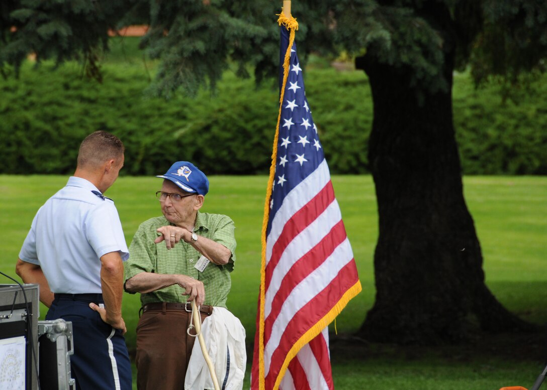 Major Bland discusses the Air force with a World War II vet before concert in Yakima, WA.

