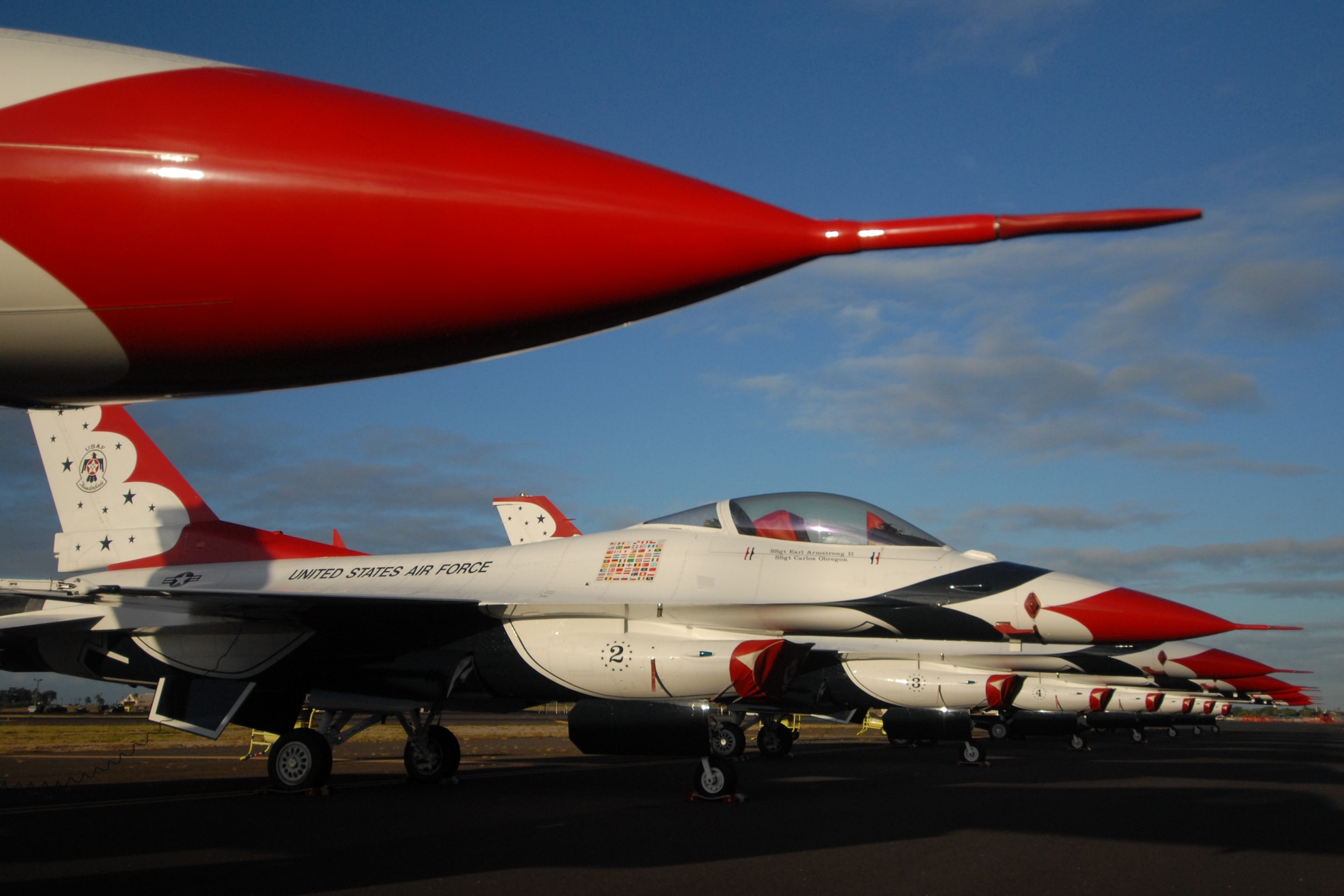 HICKAM AIR FORCE BASE, Hawaii -- The unique paint scheme of the Thunderbirds, the U.S. Air Force Demonstration Squadron, is a recognized symbol of aerial precision and greatness across the globe. The preformed before a crowd of nearly 100,000 people during Hickam Air Force Base's "Wings Over the Pacific," Open House Sept. 19-20. The Thunderbirds demonstrate the capabilities the F-16 Fighting Falcon by performing combat maneuvers during their aerial demonstration. This is Hickam's first open house since 2003, and a crowd of nearly 100,000 paid a visit during the weekend. (U.S. Air Force photo/Staff Sgt. Mike Meares)