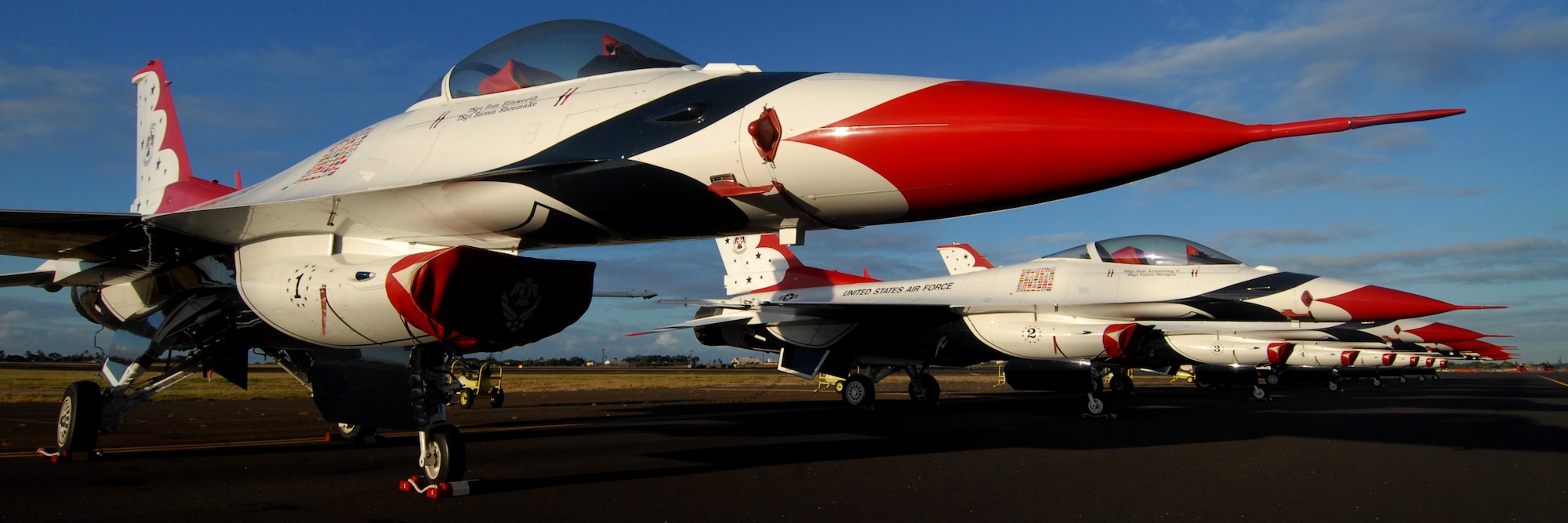 HICKAM AIR FORCE BASE, Hawaii -- The unique paint scheme of the Thunderbirds, the U.S. Air Force Demonstration Squadron, is a recognized symbol of aerial precision and greatness across the globe. The preformed before a crowd of nearly 100,000 people during Hickam Air Force Base's "Wings Over the Pacific," Open House Sept. 19-20. The Thunderbirds demonstrate the capabilities the F-16 Fighting Falcon by performing combat maneuvers during their aerial demonstration. This is Hickam's first open house since 2003, and a crowd of nearly 100,000 paid a visit during the weekend. (U.S. Air Force photo/Staff Sgt. Mike Meares)