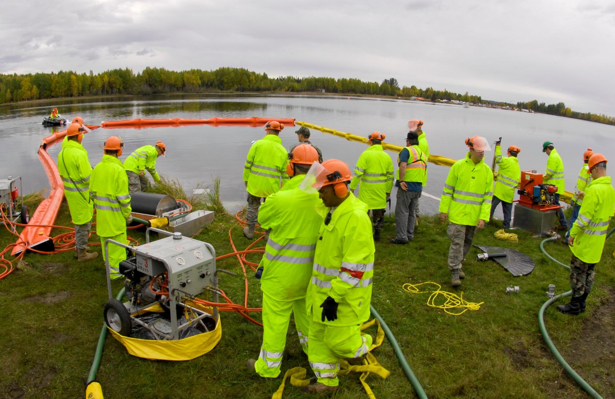 ELMENDORF AIR FORCE BASE, Alaska – Nearly 60 members from the 611th Civil Engineer Squadron practiced cleaning up a hazardous spill here Sept. 17. The 611th held its annual Fall Spill Drill Sept. 14-18. The 611th CES members are required to do hands-on training twice a year, one in the winter and practiced on thick ice and the second in the fall before the ice freezes over. (U.S. Air Force photo/Airman 1st Class Christopher Gross)