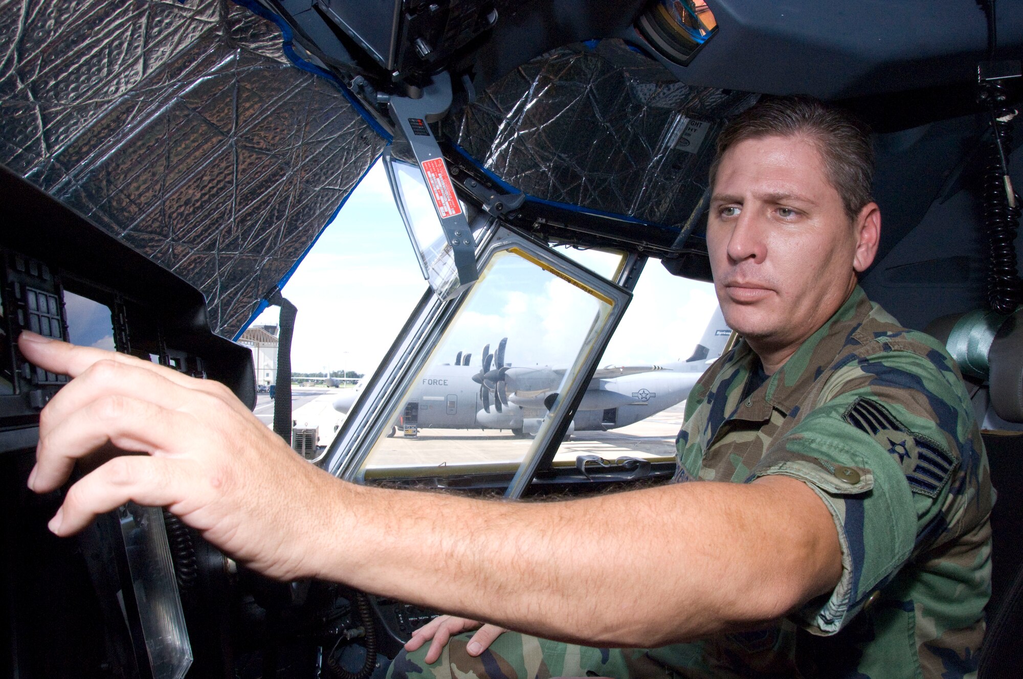 Staff Sgt. Michael Giovengo, a 403rd Avionics Flight instruments/flight control systems trainer, runs an operations check of the Heads Up Display on the flight deck of a WC-130J aircraft for the 53rd Weather Reconnaissance Squadron. Avionics flight members perform regular equipment inspections on the weather birds, as well as the tactical C-130J-30 stretch models used by the 815th Airlift Squadron, to ensure the planes are in top-notch flying condition.