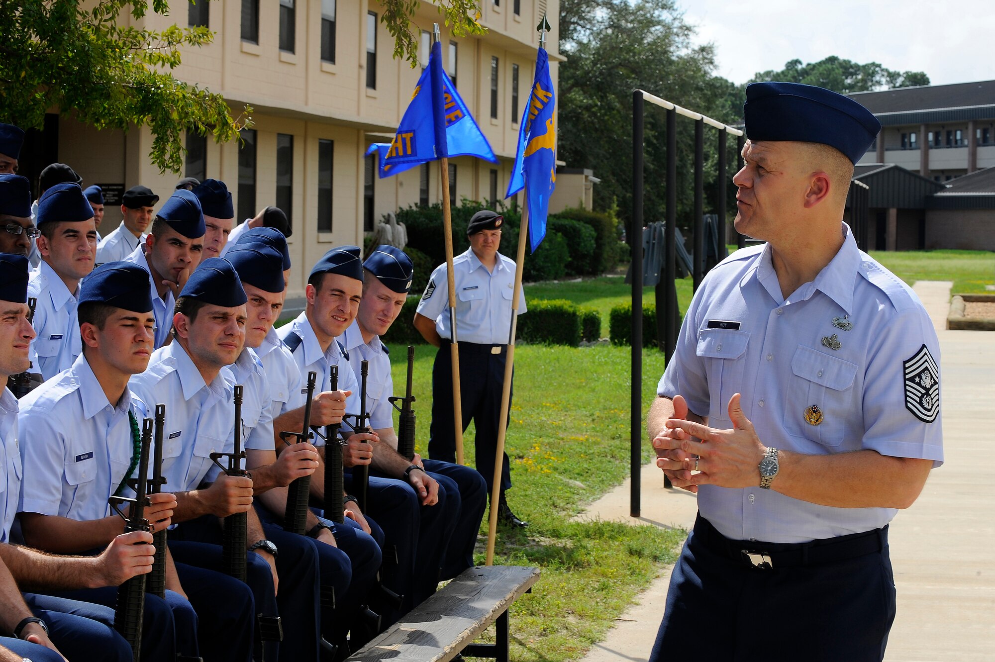 Chief Master Sergeant of the Air Force James A. Roy speaks with Tactical Air Control Party students outside their school house during a visit Sept. 21, 2009, to Hurlburt Field, Fla. (U.S. Air Force photo by Senior Airman Jason Epley/Released)