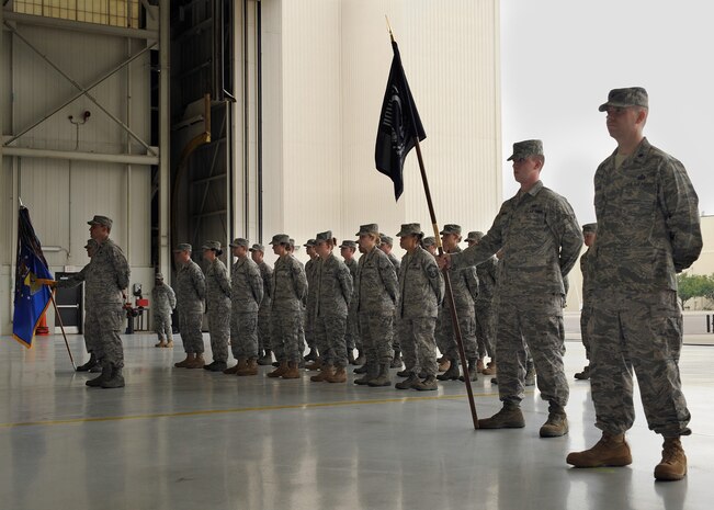 Team Charleston Airmen stand in formation during a retreat ceremony at Nose Dock 2  Sept. 18. Charleston Airmen participated in the ceremony and other events Sept. 17 to 18, paying respect to prisoners of war and those listed as missing in action. (U.S. Air Force photo/Senior Airman Katie Gieratz)