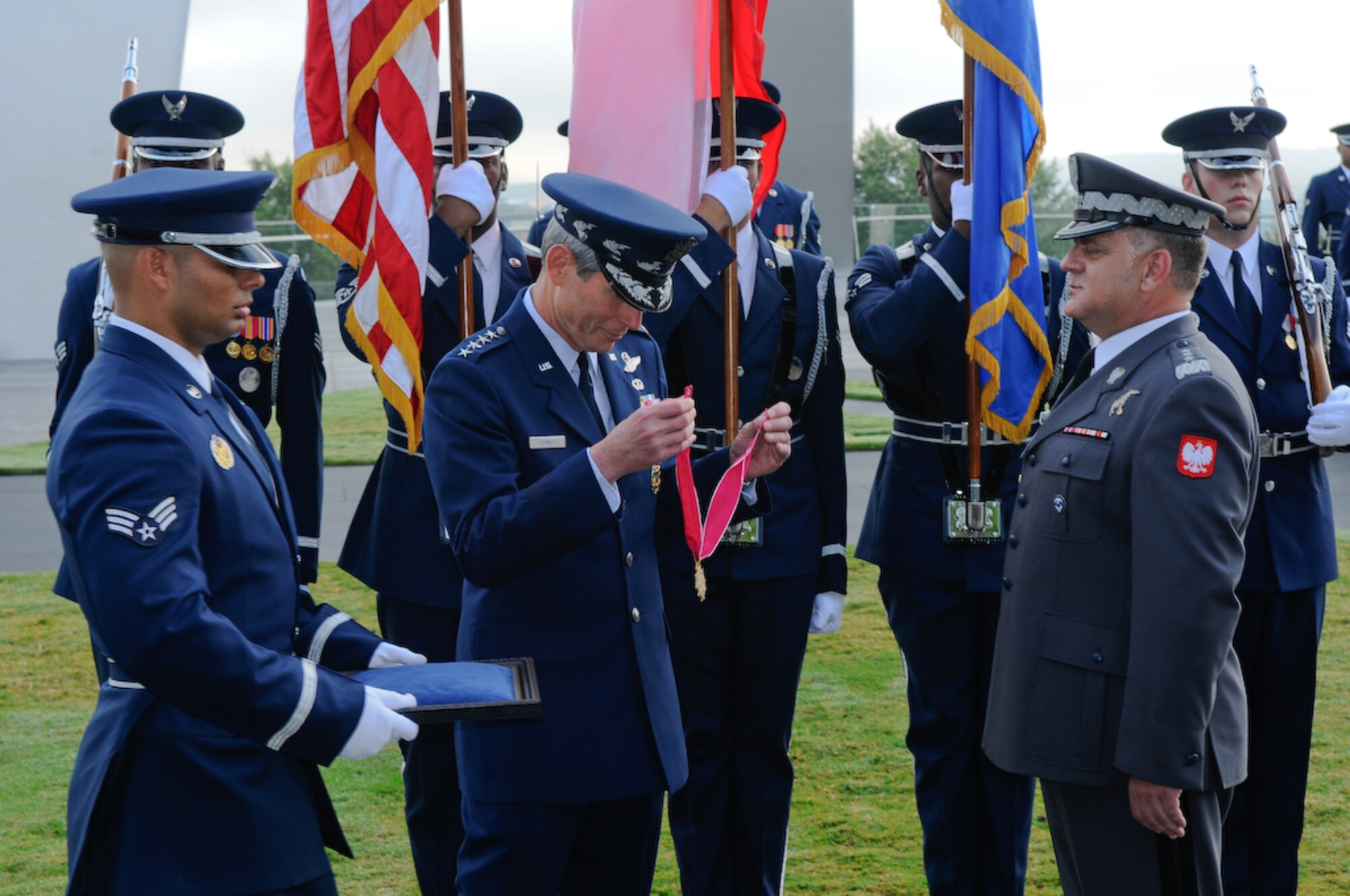 Gen. Norton A. Schwartz, Air Force chief of staff, presents the Legion of Merit to Lt. Gen. Andrzej Blasik, commander of the Polish air force, at the U.S Air Force Memorial Sept. 22. This is the first United States decoration created specifically to award citizens of other nations.  The decoration was established in 1940 by an Act of Congress. (U.S. Air Force photo by Senior Airman Alexandre Montes)
