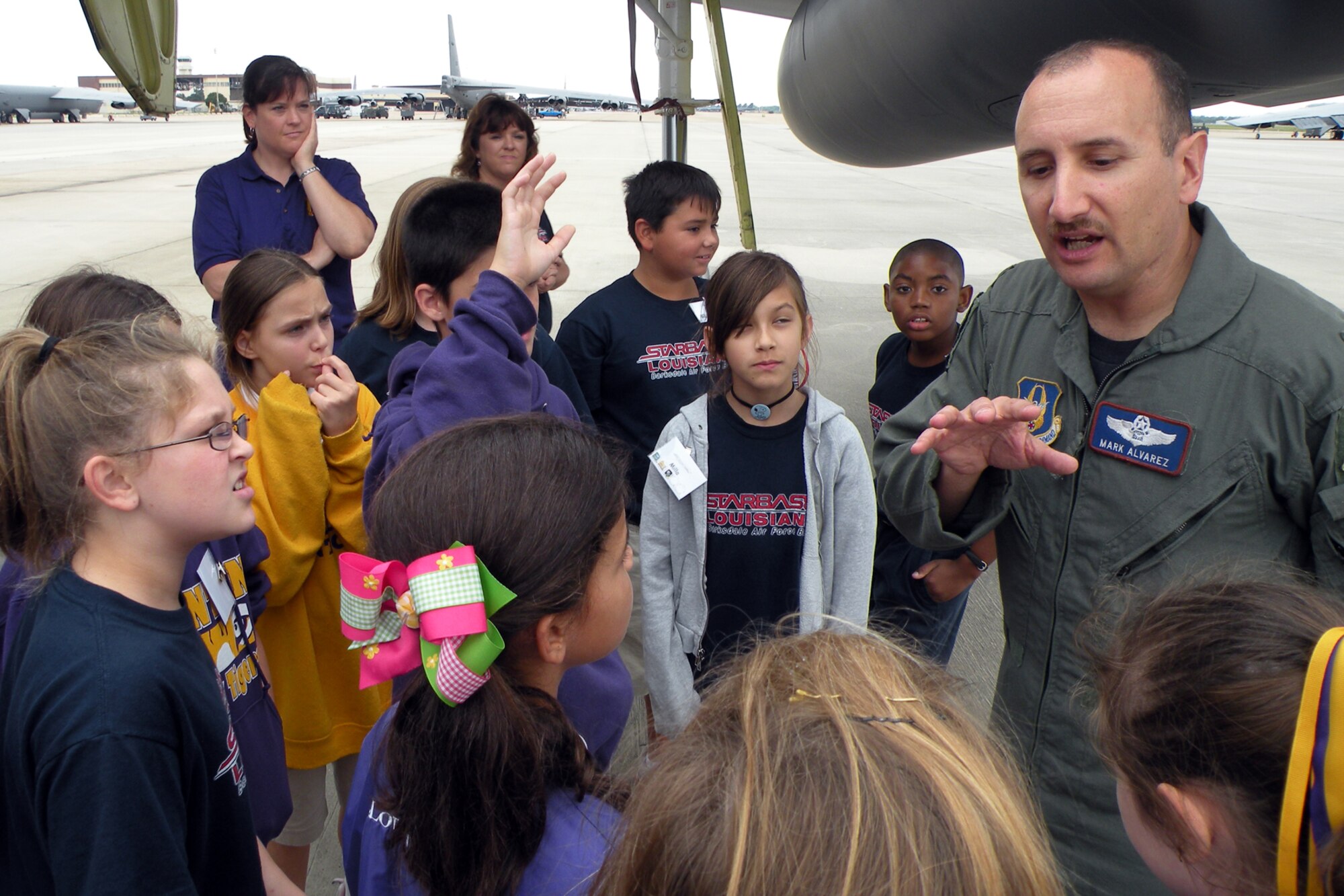 Bossier Parish Schools are back in full swing, and Benton Elementary fifth graders are going through Barksdale’s STARBASE program. Lt. Col. Mark Alvarez, chief electron warfare officer, 93rd Bomb Squadron, and 2nd Lt. Nicholas Krayvo, a student at the 11th Bomb Squadron, took the time to tell the students about the B-52 Stratofortress aircraft at Barksdale Air Force Base, La., September 22, 2009. Both officers are working together as part of the total force initiative in progress at Barksdale AFB. (U.S. Air Force photo/Betty Stephens)