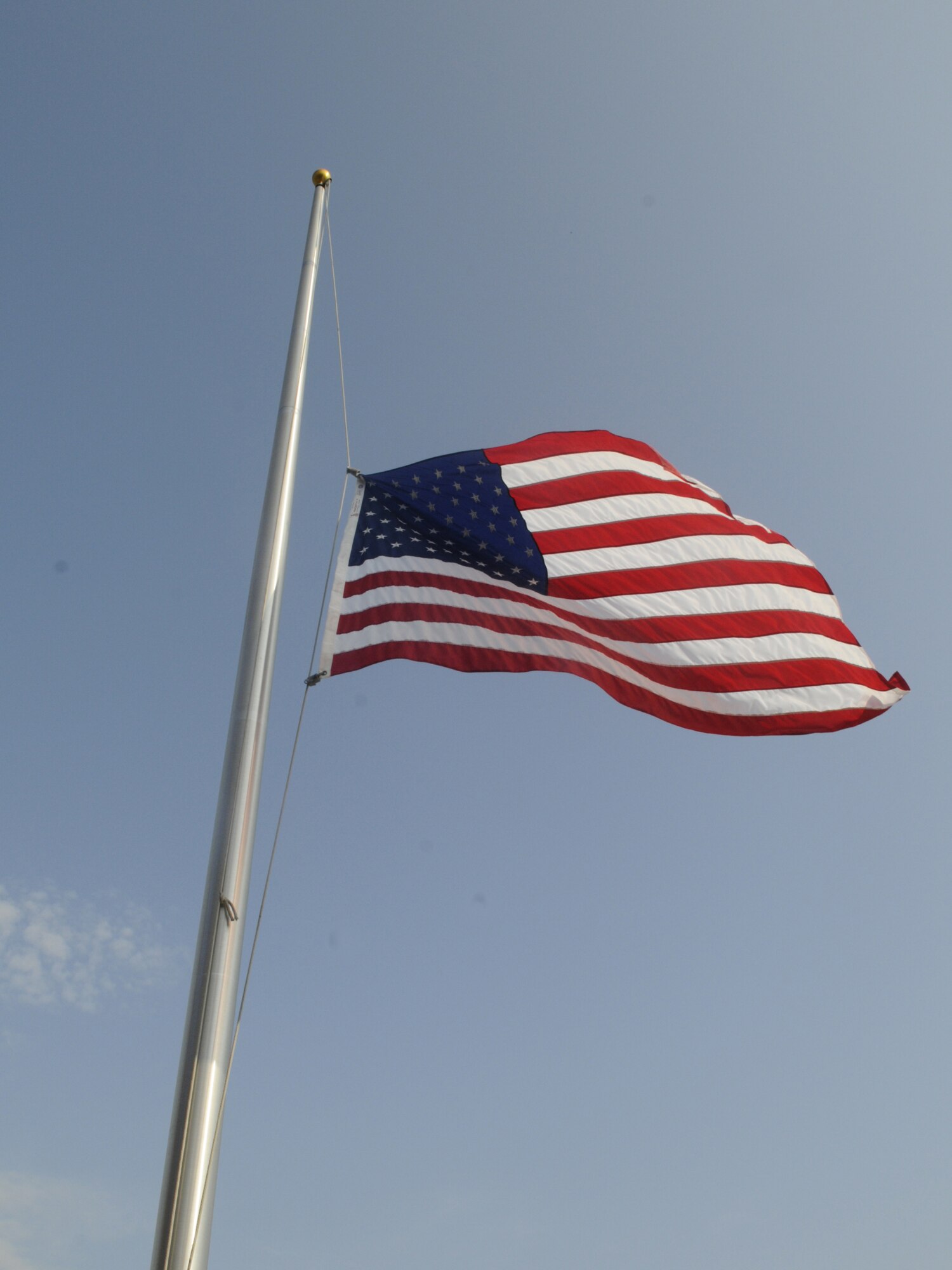 U.S. Flag at half staff.