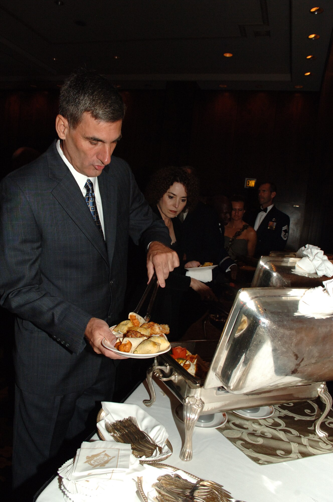 Members of Team Buckley enjoy food at the Air Force Ball.  (U.S. Air Force photo by Tech. Sgt. J. LaVoie)