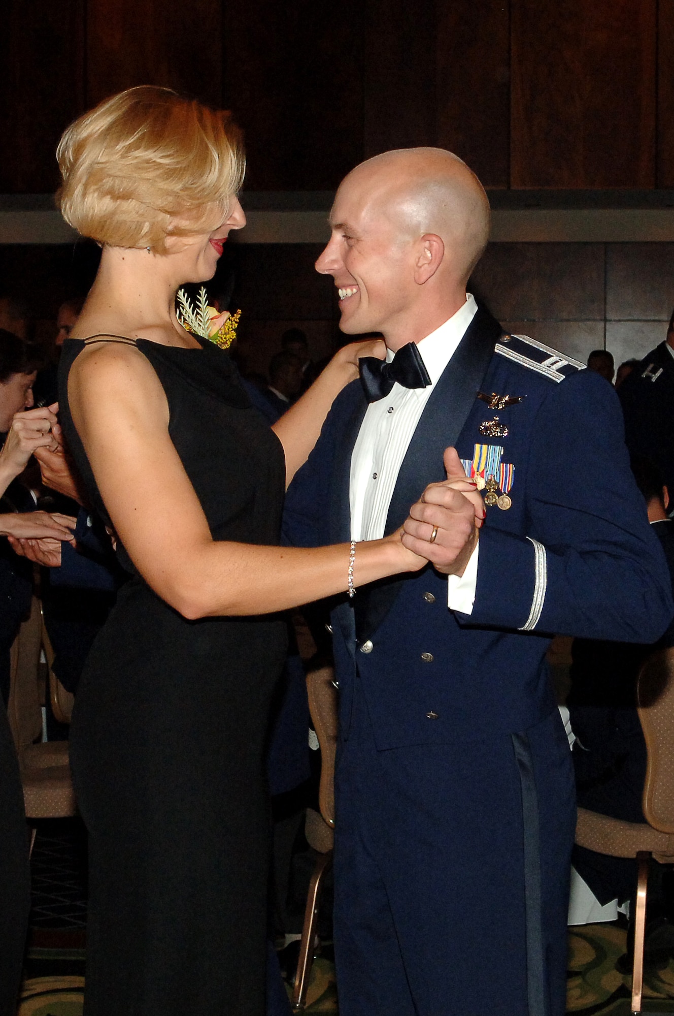 Husband and wife, Capt. Christopher Michele, Det. 1, and Adrianne Michele, 460th Space Wing, share a waltz during the Air Force Ball.  A DJ was on hand to play everything from the electric slide to the twist. (U.S. Air Force photo by Tech. Sgt. J. LaVoie