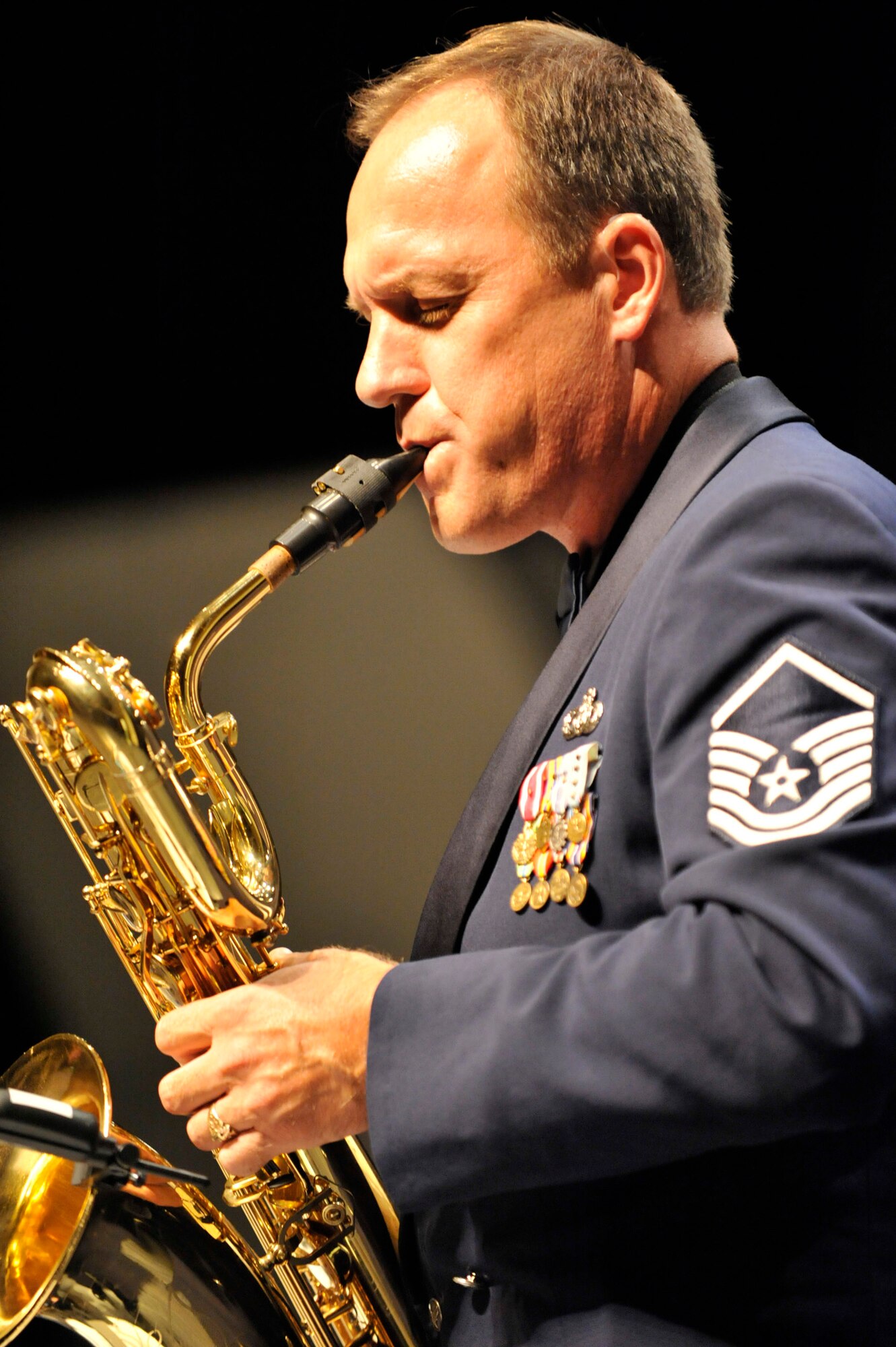 MINOT, N.D. -- Master Sgt. Dan Weber, Heartland of America Air Force Band Noteables saxophonist, plays during a concert at Minot State University Sept. 17 here. This sleek, vibrant jazz ensemble presents exciting, uplifting music inspiring audiences to increased patriotism. (U.S. Air Force Photo by Senior Airman Matthew Smith)