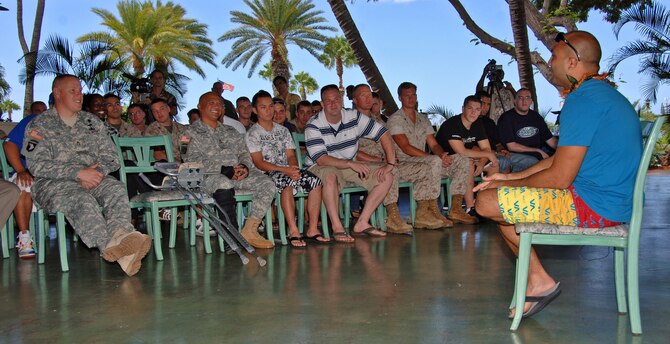 HICKAM AIR FORCE BASE, HAWAII – Fifty U.S. Marine Corps and Army Wounded Warriors meet Mixed Martial Arts Ultimate Fighting Lightweight Champion, BJ Penn at the Officer's Club here Sept.18. Penn was here for the 2009 Open House, and took time out of his busy flying and meet-and-greet schedule to express his appreciation for military servicemembers who have been wounded in action. There are several Wounded Warrior programs in Hawaii. Services include entitlement and benefits counseling; educational and employment assistance; transition and family services; and travel pay for family members on Invitational Travel Orders. Additionally, the center offers substance abuse information and referral for family members, and it coordinates legal and pastoral services. (U.S. Air Force photo by Vanessa M. Forloine) 