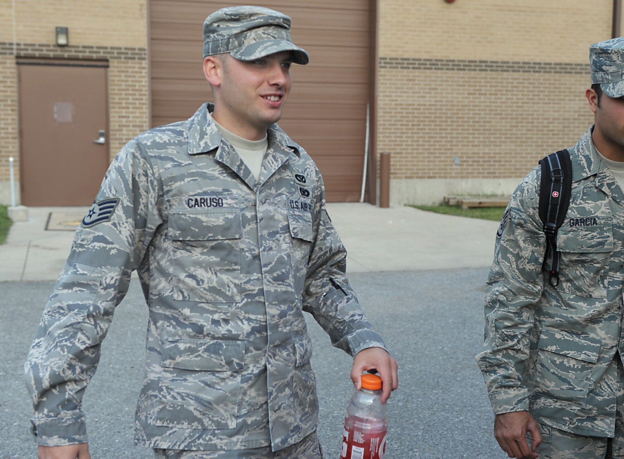 Staff Sgt. Anthony Caruso waits his turn to board a bus bound for the flightline at McConnell Air Force Base, Kan., on Sept. 19. He and more than two dozen of his fellow Airmen from the 931st Civil Engineer Squadron flew from the base to Atlanta for a week of training before moving on to Florida for a week-long exercise. (U.S. Air Force photo/Tech. Sgt. Jason Schaap)