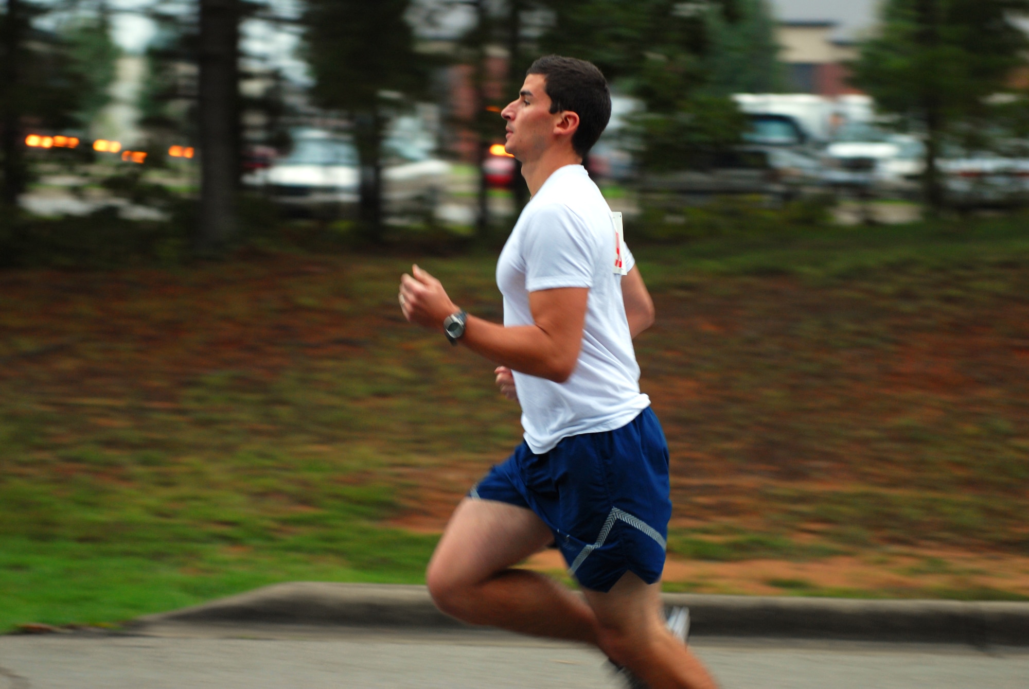 Capt. Rocky Liesman, 19th Medical Operations Squadron, runs down Vandenberg Boulevard while participating in the base Eco Challenge Sept 19. Captain Liesman ran and paddled his way to a first place finish in the competition. (U.S. Air Force photo by Senior Airman Nathan Allen)