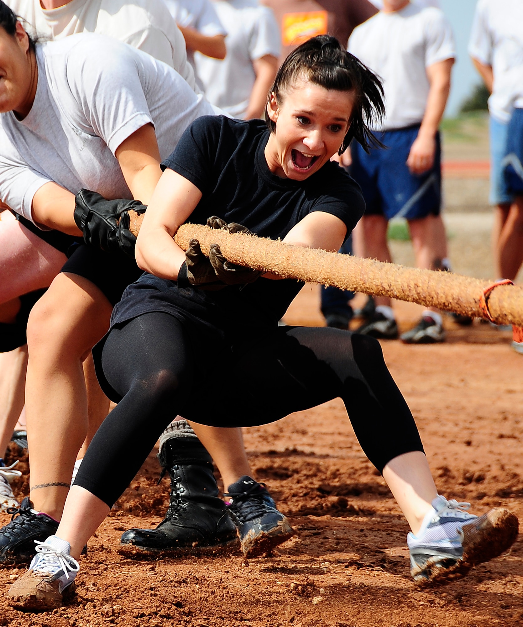 HOLLOMAN AIR FORCE BASE, N.M. -- Senior Airman Rachael Fontano, 49th Operations Group, pulls as hard as she can at the tug of war during the Wing Sports Day Sept. 18. (U.S.Air Force photo by Tech. Sgt. Chris Flahive)