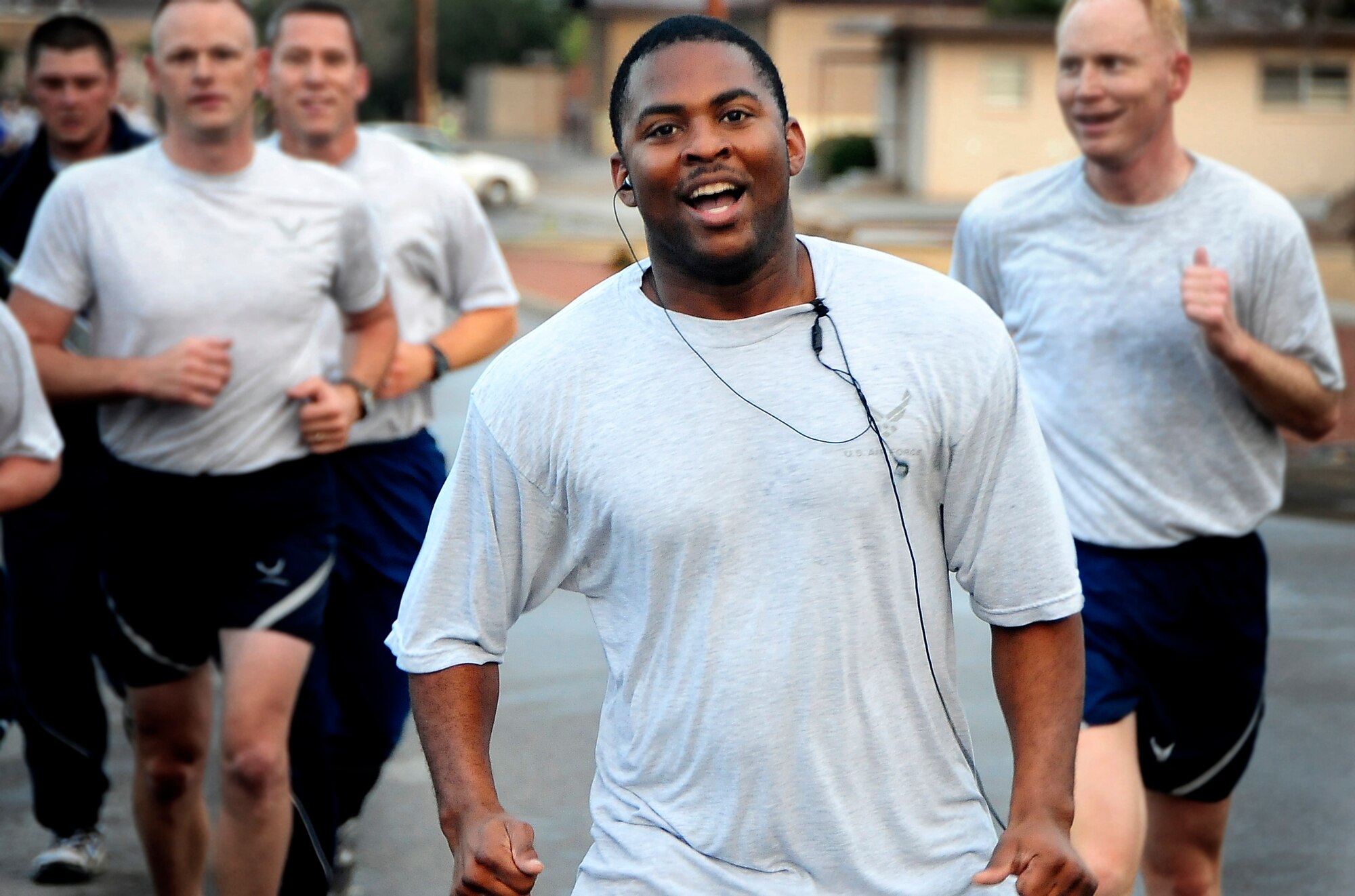HOLLOMAN AIR FORCE BASE, N.M. -- Staff Sgt. William Holmes of the 49th Force Support Squadron calls cadence for his unit during the 49th Fighter Wing run on Sports Day Sept. 18. (U.S.Air Force photo by Tech. Sgt. Chris Flahive)