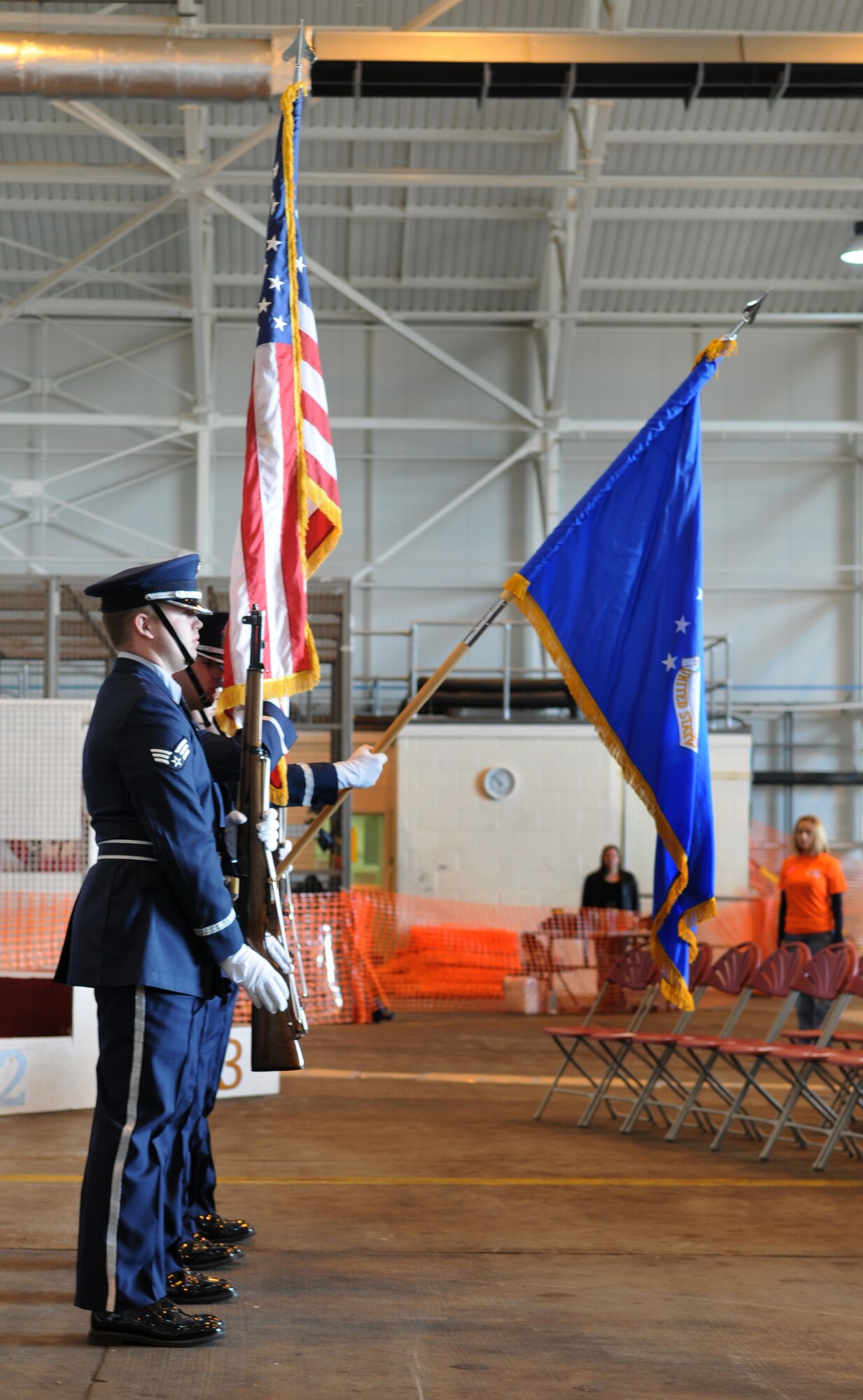 RAF MILDENHALL, England -- The RAF Mildenhall Honor Guard presents the colors before the start of the 28th Annual Joan Mann Special Sports Day at Hangar 711 Sept. 19. Volunteers from across RAFs Mildenhall and Lakenheath joined with special-needs athletes from throughout East Anglia for the event. (U.S. Air Force photo/Senior Airman Thomas Trower)