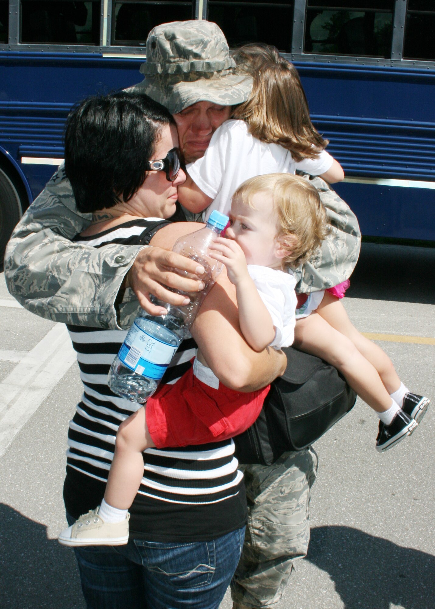Senior Airman Robert Sochor, 728th Air Control Squadron surveillance technician, receives a welcome home hug after returning from his first Operation Iraqi Freedom deployment with his unit Sept. 21. As one of the Air Force’s four unique Control and Reporting Centers, more than 150 members of the 728th ACS provided command and control of joint air operations using surveillance, identification, weapons control, battle management and theater data links while overseas. (U.S. Air Force photo/2nd Lt. Andrew Caulk)