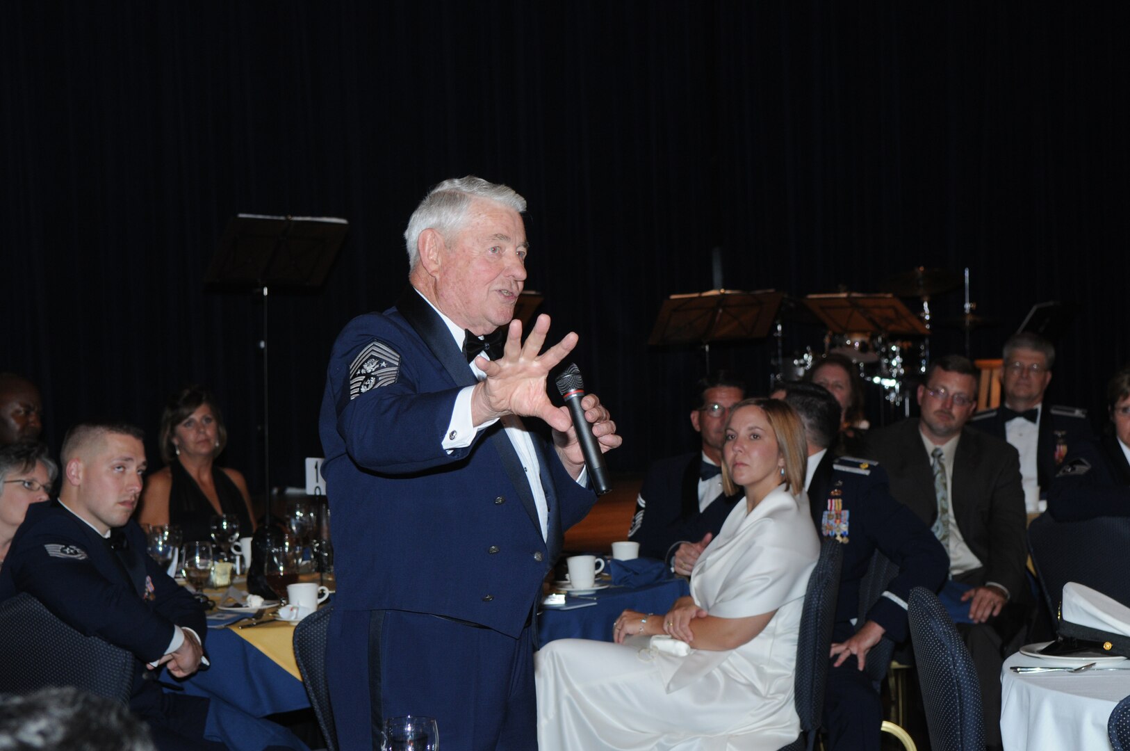 Retired Chief Master Sgt. of the Air Force Robert Gaylor, the 5th CMSAF, speaks to a capacity crowd at the Air Force Personnel Center dining out Sept. 18.  The dining out was held to commemorate the 62nd birthday of the Air Force.  (U.S. Air Force photo/Rich McFadden) 