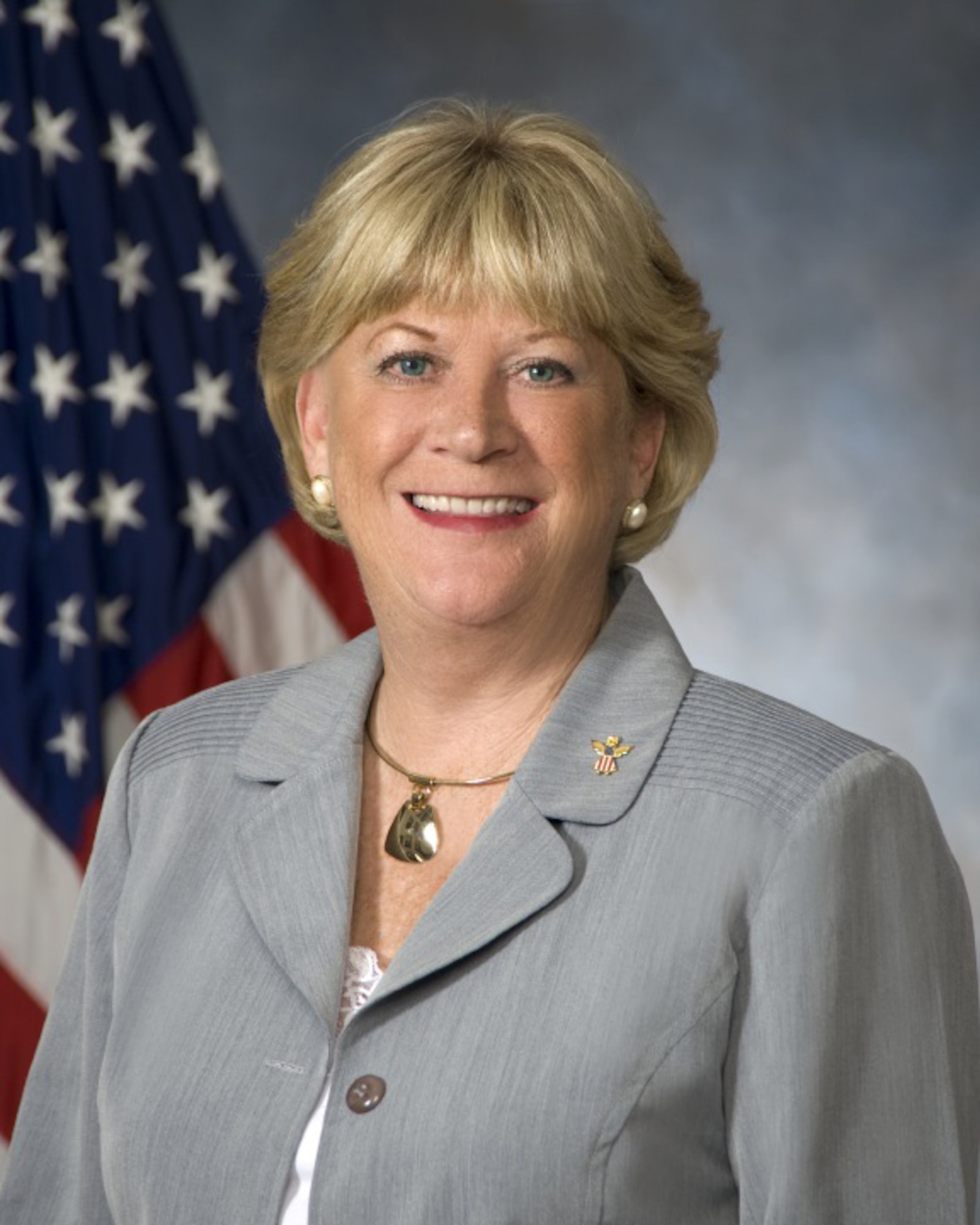 Kathy Houchins, chairman of the Fort Walton Beach Military Affairs Committee, was inducted as an Air Armament Center James E. Plew Outstanding Community Ambassador. (U.S. Air Force Photo/Mike Fleck)
