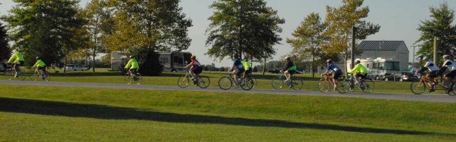 Special Olympic competitors take a practice lap along Perimeter Road before the bicycle race Sept. 19.  More than 30 competitors signed up for the event.  (U.S. Air Force photo/Staff Sgt. Chad Padgett)