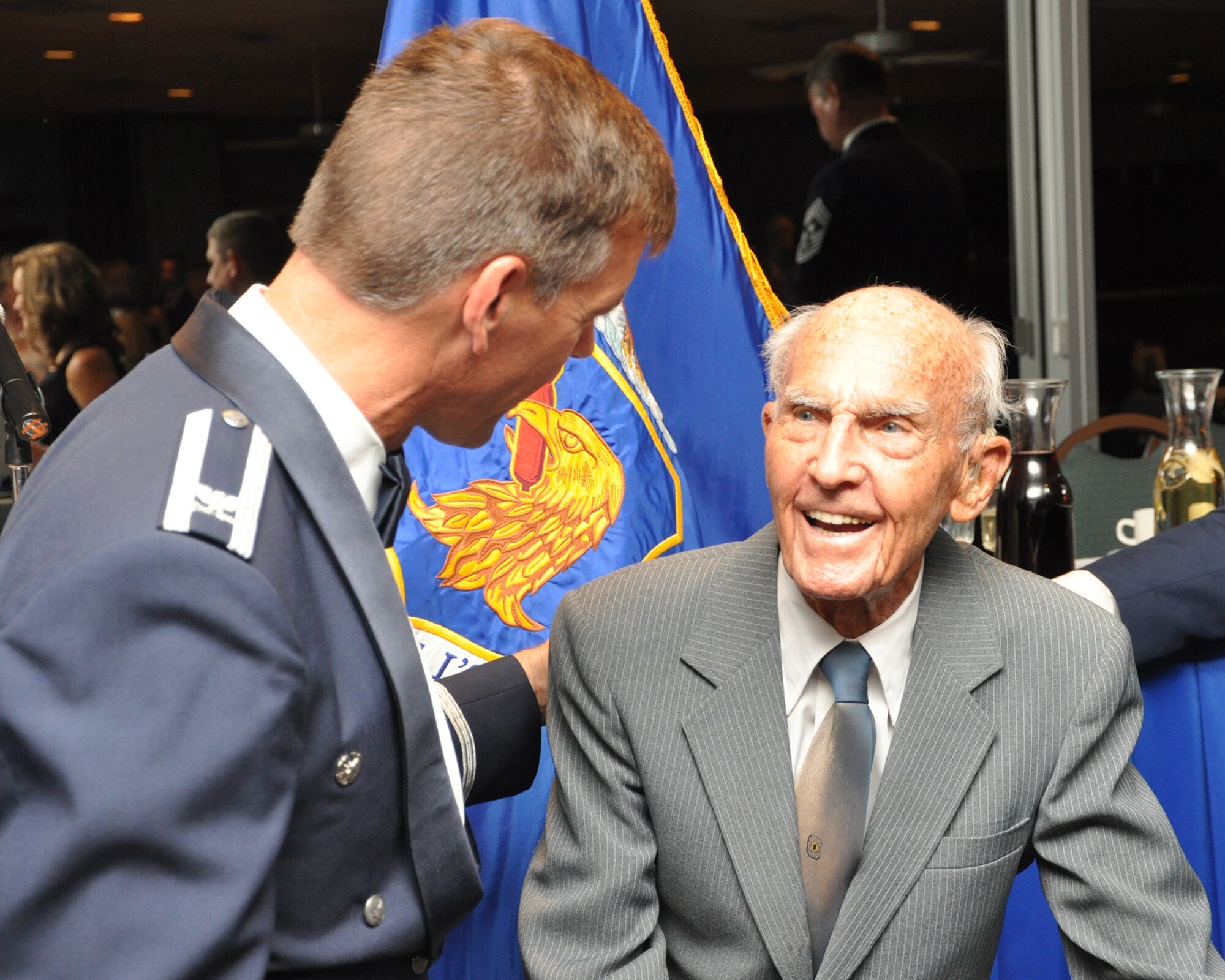 Col. Joe Stanley, a former Eglin installation commander, greets Col. Bruce McClintock, current 96th Air Base Wing commander, during the Gathering of Falcons Dining Out Sept. 19 at the Eglin officers' club.  The event had three guest speakers from different eras of Eglin.  (U.S. Air Force photo/Staff Sgt. Bryan Franks.)
