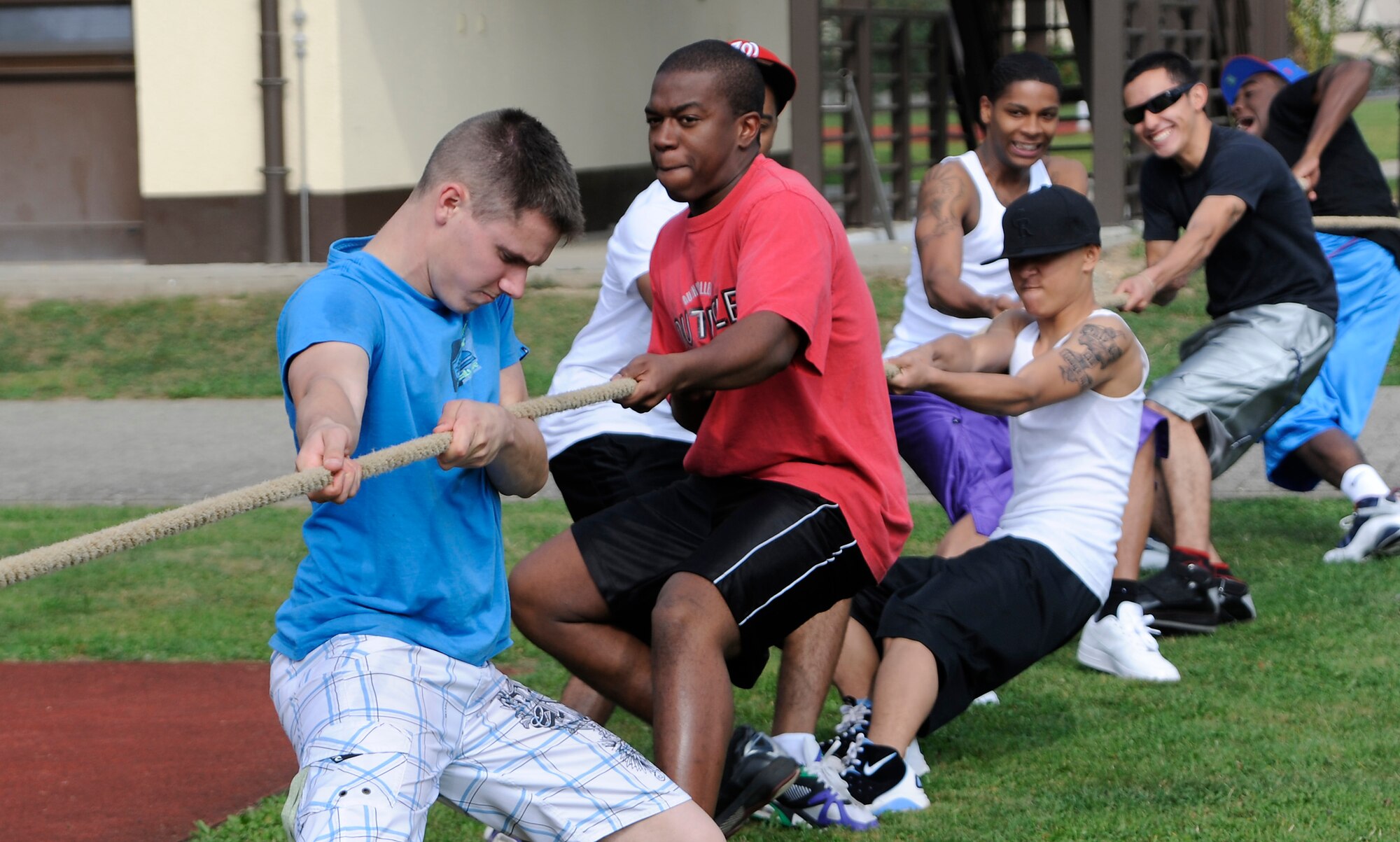 SPANGDAHLEM AIR BASE Germany – Spangdahlem dorm residents take part in a tug-of-war competition during the annual Airman’s Block Party Sept. 19.  Airmen enjoyed various games and a burger cookout sponsored by the 52nd Fighter Wing First Sergeants and Spangdahlem First IV in an effort to boost morale. The 52nd Security Forces Squadron won the most events and took home the “Battle of the Dorms” trophy. (U.S. Air Force photo/Master Sgt. Bill Gomez)