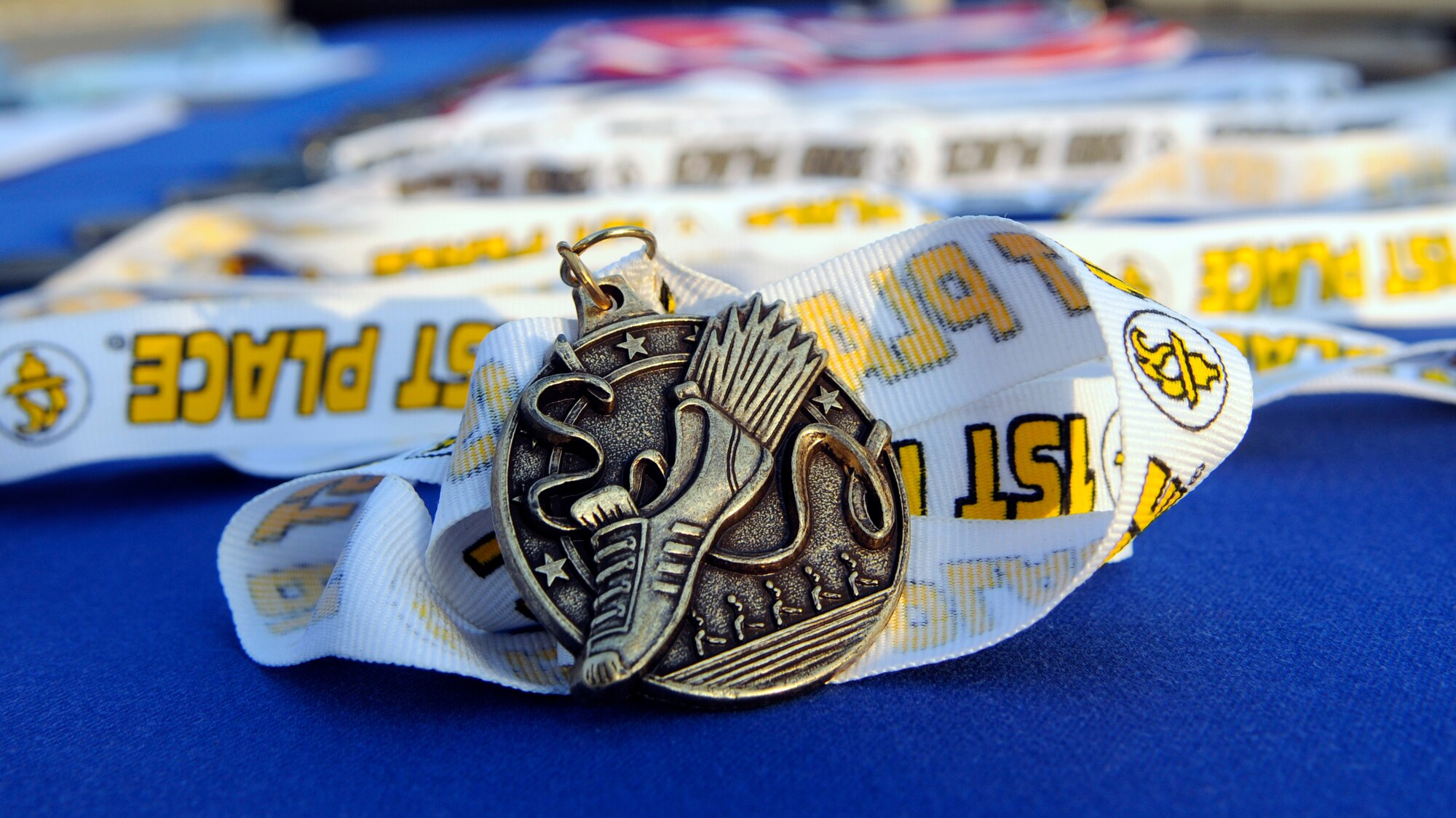Medals await to be awarded at the Incirlik Half Marathon Saturday, Sept. 19, 2009.  More than 80 runners participated in the event.  Medals were awarded for the first, second and third place winners for men over 35, women over 35, men under 35, women under 35 and relay teams.  (U.S. Air Force photo/Staff Sgt. Raymond Hoy)