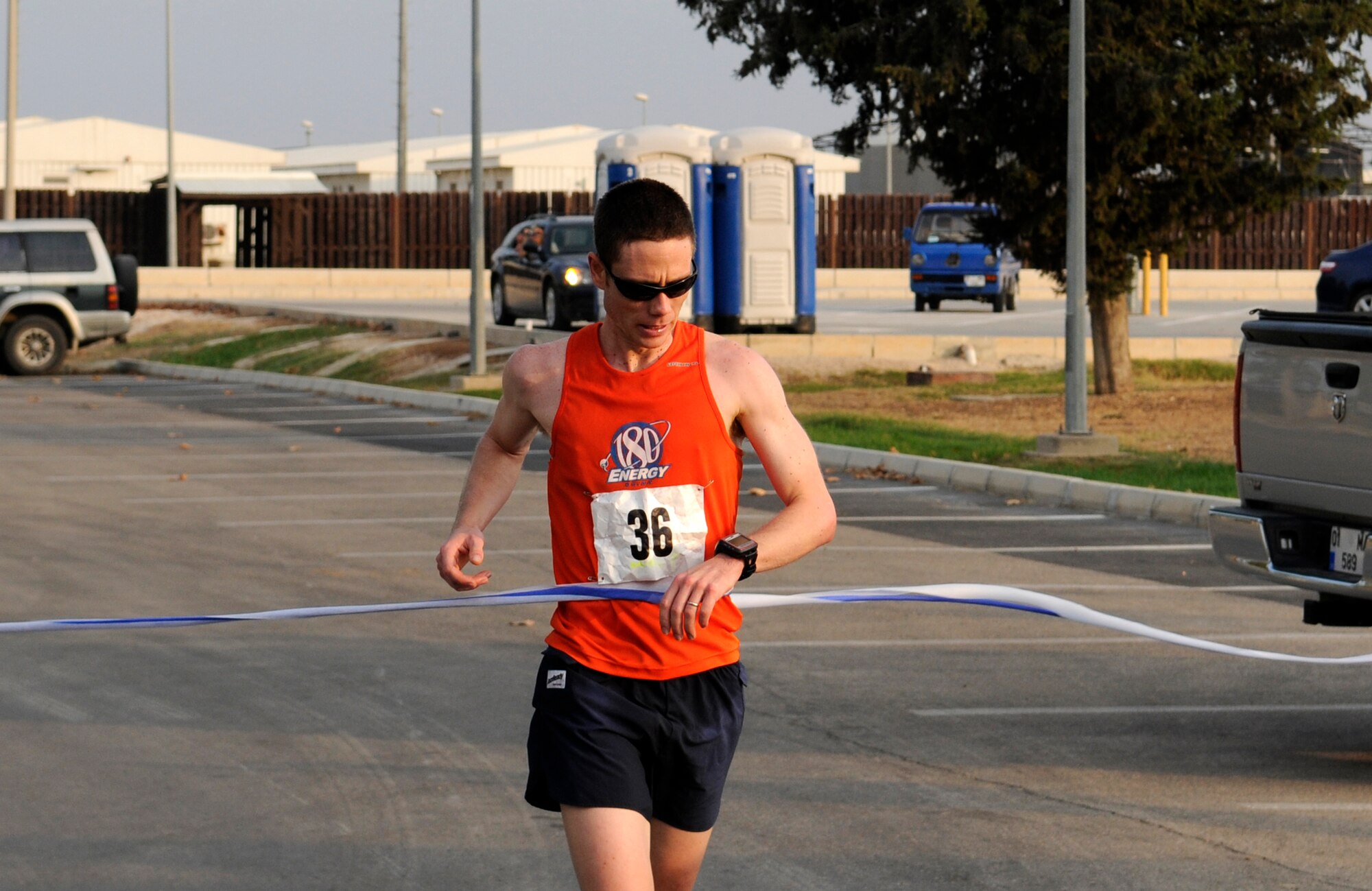 Seth Jenny, 39th Medical Operations Squadron, crosses the finish line at the Incirlik Half Marathon Saturday, Sept. 19, 2009.  Jenny came in first overall with a time of 1 hour, 22 minutes and 11 seconds.  More than 80 runners participated in the event.  (U.S. Air Force photo/Staff Sgt. Raymond Hoy) 