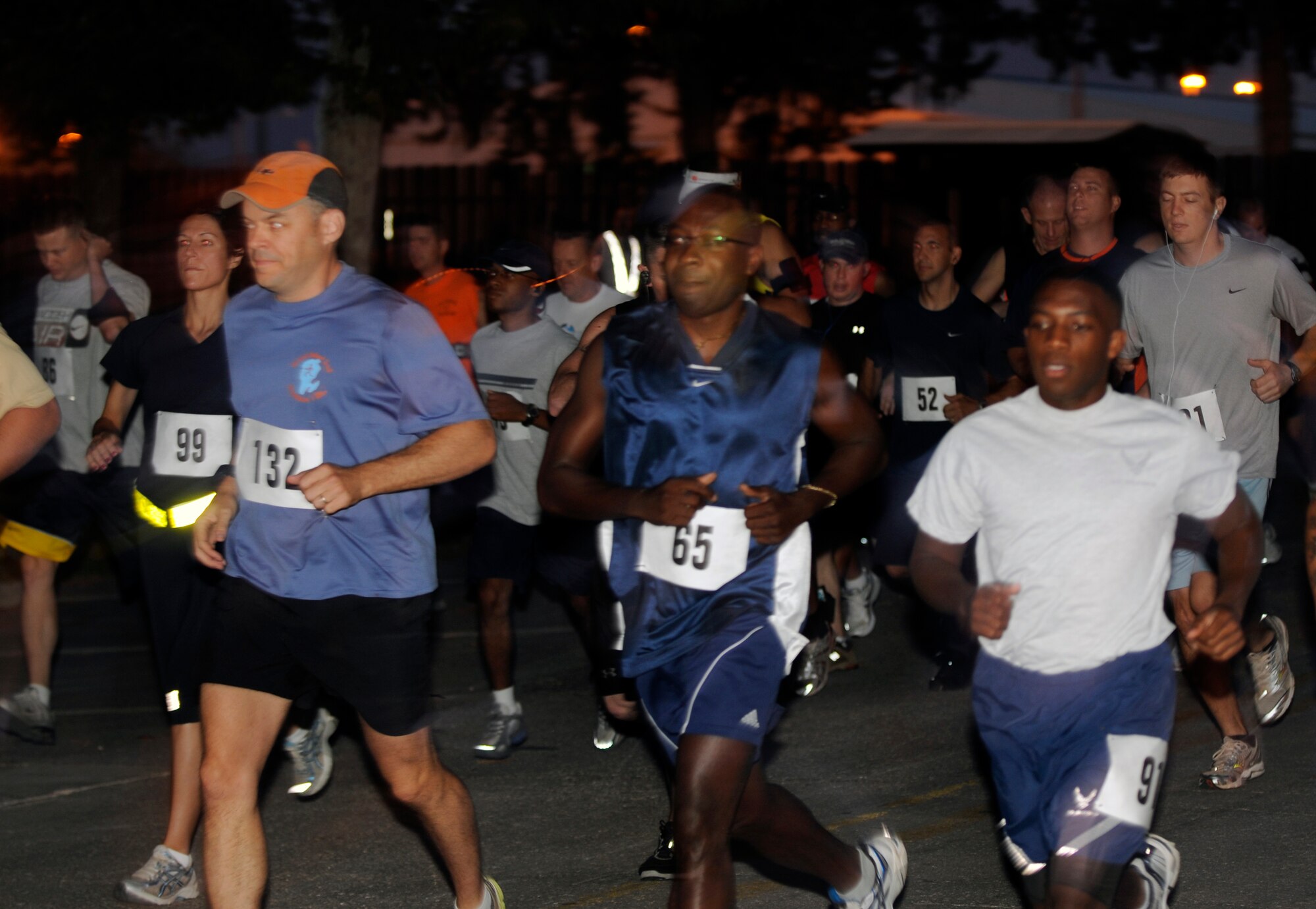 Runners take off from the starting line of the Incirlik Half Marathon Saturday, Sept. 19, 2009.  Participants started at 6 a.m. for the more than 13 mile run.  Seth Jenny, 39th Medical Operations Squadron, came in first overall with a time of 1 hour, 22 minutes and 11 seconds.  More than 80 runners participated in the event.  (U.S. Air Force photo/Staff Sgt. Raymond Hoy)