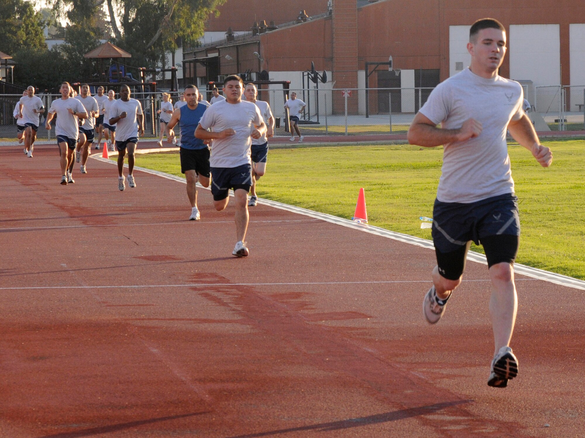 Incirlik Airmen begin interval running Wednesday, Sept. 17, 2009, during a physical training session at Incirlik Air Base, Turkey. Craig Virgin, along with Karen Fox, came to Incirlik for morale support and to help start off Incirlik’s half-marathon. (U.S. Air Force photo by/Airman 1st Class Amber Ashcraft)