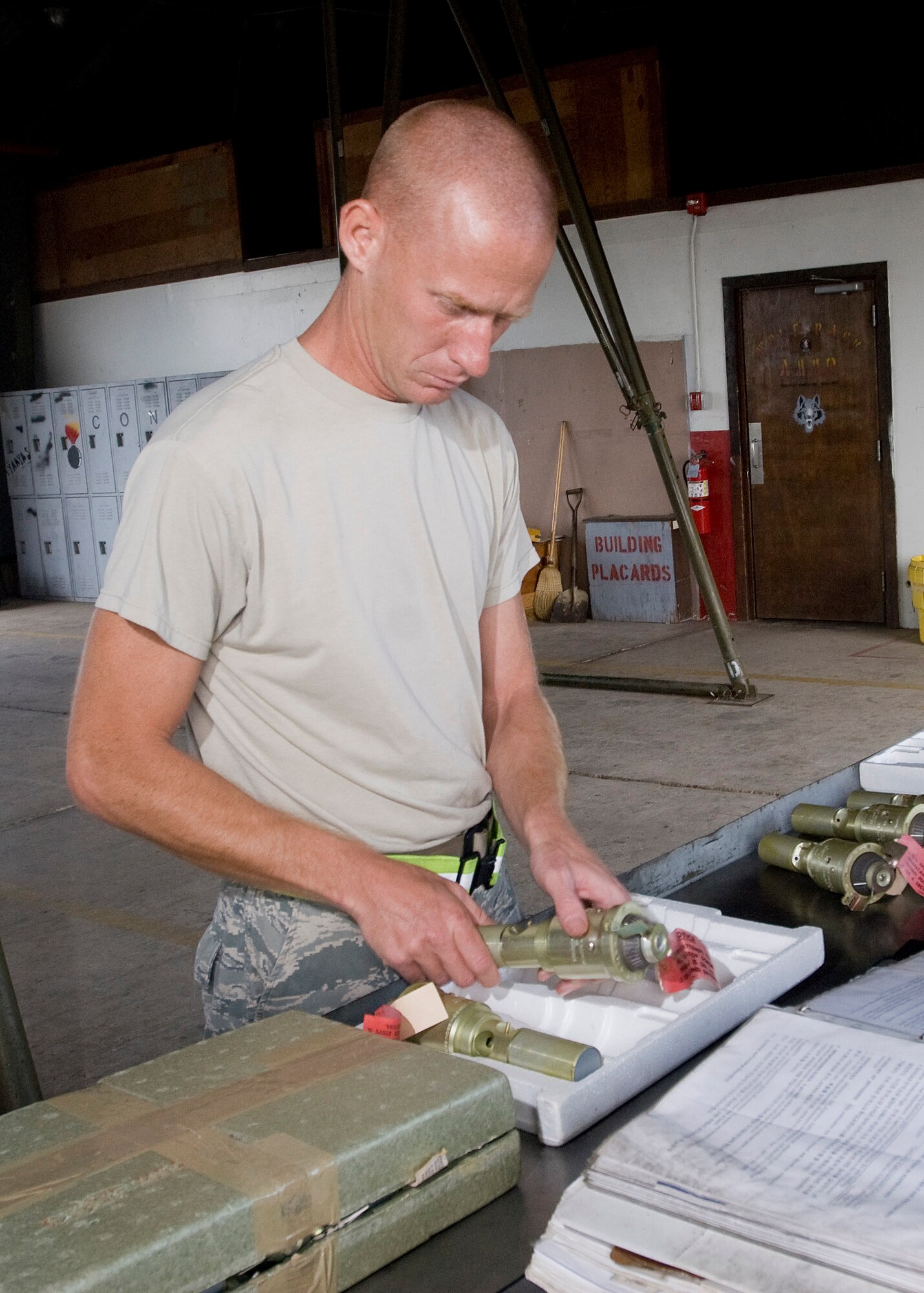 KUNSAN AIR BASE, Republic of Korea -- Tech. Sgt. Kevin Wojcik, 8th Maintenance Squadron, places a nose fuse from a MK-82, a 500 pound free fall, general- purpose bomb, in styrofoam for storage Sept. 22. The MK-82 is being disassembled to preserve service life of the components for future use. (U.S. Air Force photo / Senior Airman Jonathan Steffen)