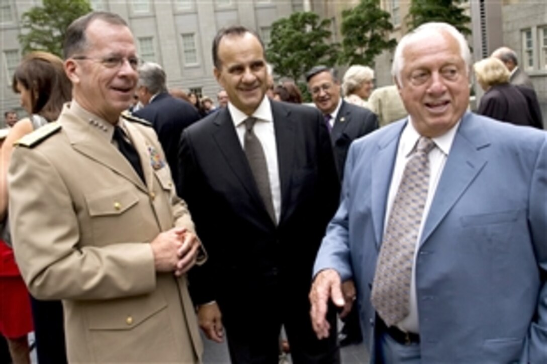 U.S. Navy Adm. Mike Mullen, chairman of the Joint Chiefs of Staff, speaks with Los Angeles Dodger Manager Joe Torre and Tommy Lasorda, Baseball Hall of Fame Dodger manager, at the unveiling of Lasorda's portrait at the National Portrait Gallery in Washington, D.C., Sept. 22, 2009. Lasorda traveled with Mullen in April to visit troops in Afghanistan.