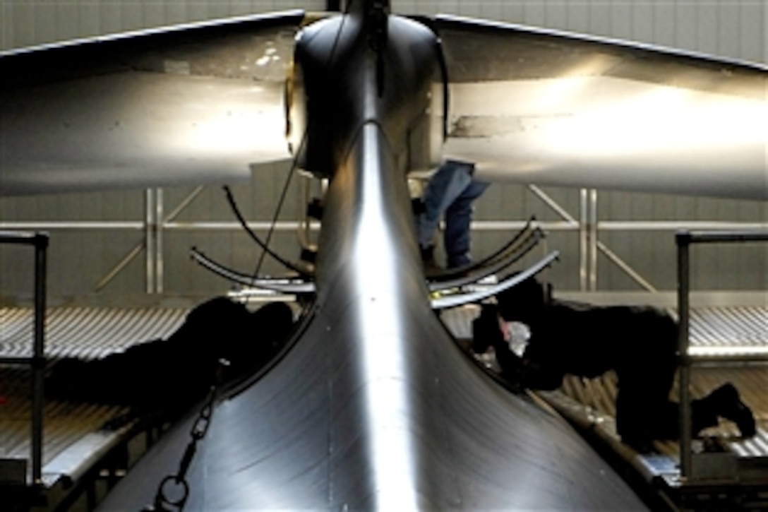 U.S. Air Force's 28th Maintenance Squadron members perform an isochronal inspection on a B-1B Lancer bomber on Ellsworth Air Force Base, S.D., Sept. 17, 2009. During this inspection, airmen look for and repair cracks, chafed wires, worn seals, leaks and other damage to the aircraft.