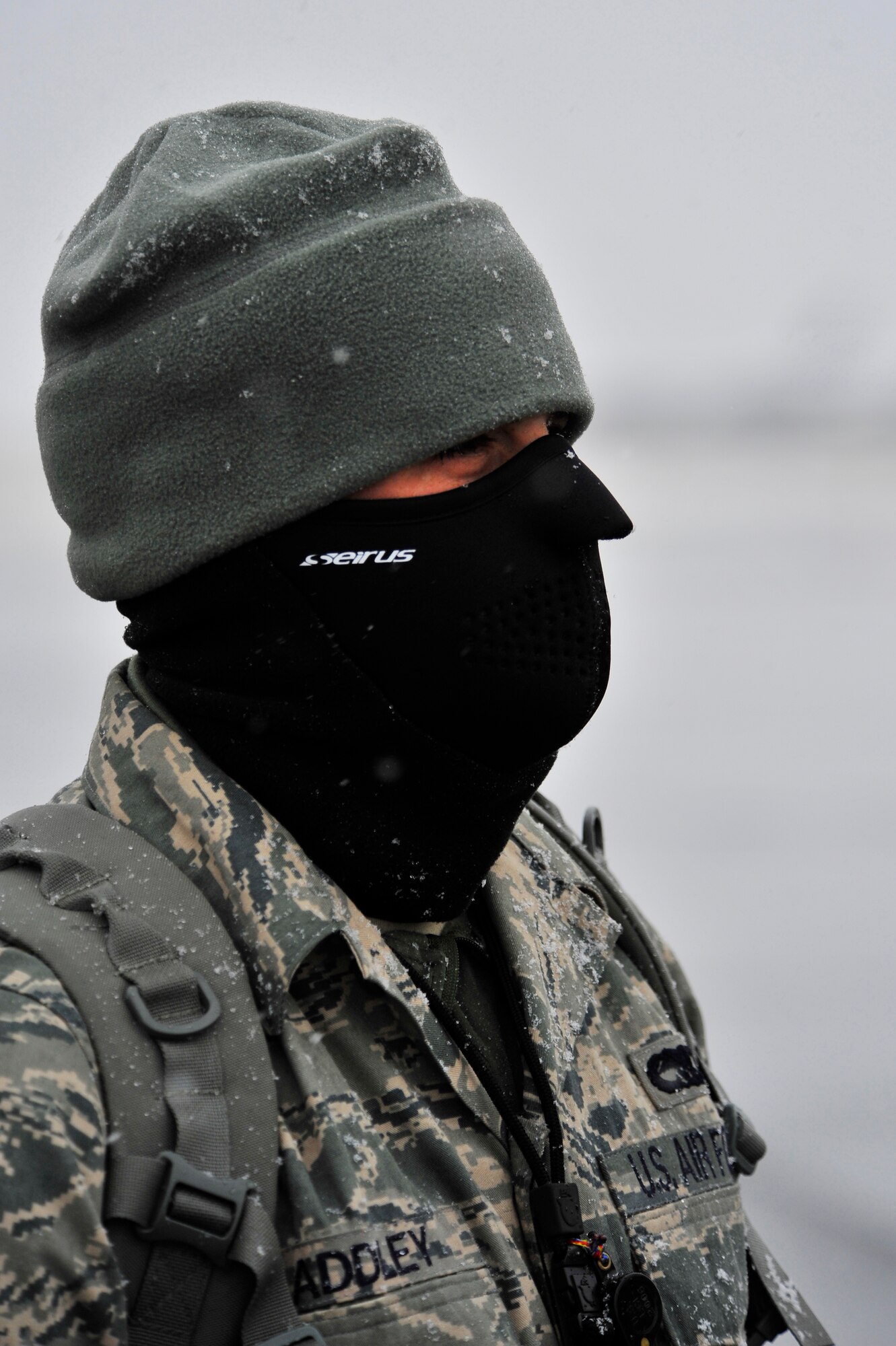 Senior Airman Nathaniel Addley waits to launch an aircraft during Eielson's first snow fall Sept. 23, 2009, Eielson Air Force Base, Alaska. Airman Addley is a crew chief assigned to the 8th Aircraft Maintenance Squadron, Kunsan AB, Republic of Korea, deployed here to participate in RED FLAG-Alaska. (U.S. Air Force photo/Staff Sgt. Christopher Boitz)
