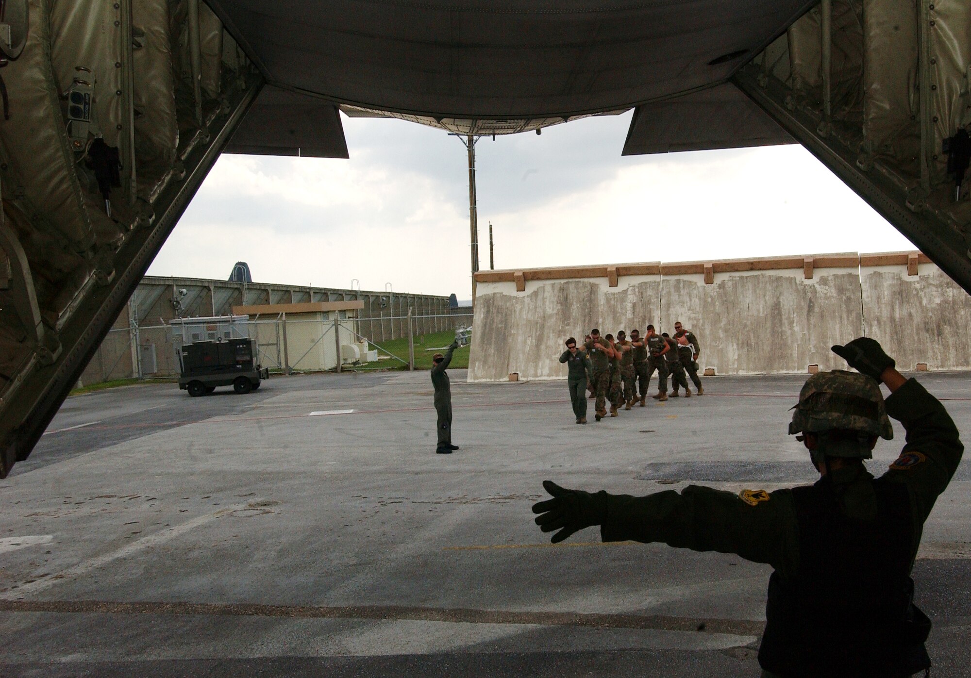 Members of the 18th Aeromedical Evacuation Squadron on-load patients to a C-130J during exercise Ryukyu Warrior II Sept. 17. Personnel from the 18th AES attend the casualties en route to higher levels of care. Ryukyu Warrior II was a mass casualty evacuation exercise conducted by Marine Aircraft Group 12, with the participation of Air Force, Army, and Navy organizations. 
(U.S. Air Force photo/Tech. Sgt. Reynaldo Ramon) 



