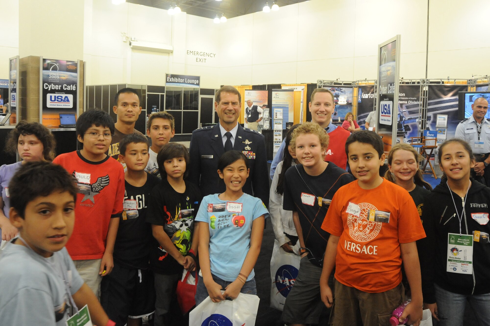 Lt. Gen. Tom Sheridan, SMC commander, visits with a group of school children touring Education Alley during AIAA’s Space 2009 Conference in Pasadena, Sept. 17.  (Photo by Atiba S. Copeland)