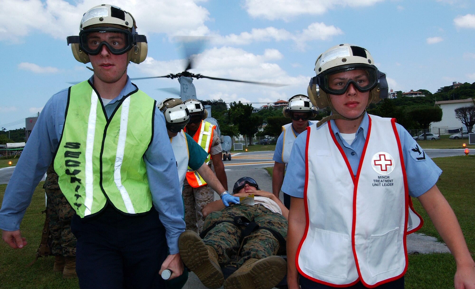A Navy litter bearer team off load patients from a CH-46 Sea Knight helicopter for Triage at Lester Hospital Sept. 17 during exercise Ryukyu Warrior II. This is one of the many portions of the exercise hosted by the Marine Aircraft Group 12 along with other organizations from the Air Force, Army, and Navy.
(U.S. Air Force photo/Tech. Sgt. Reynaldo Ramon) 