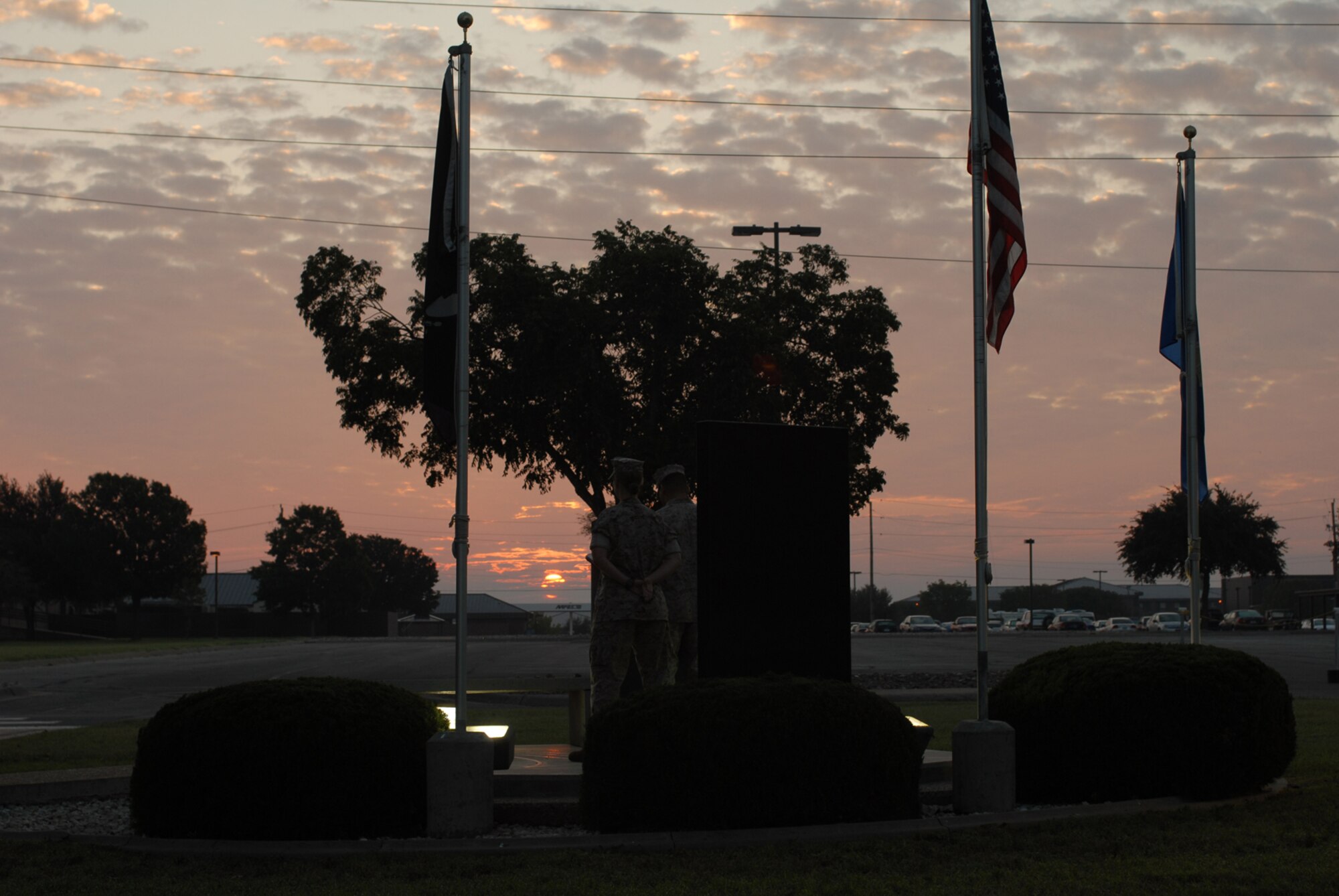 GOODFELLOW AIR FORCE BASE, Texas -- Marines stand vigil at the Prisoner of War/Missing in Action memorial during a 24-hour vigil, Sept. 19, 2009. Base personnel stood a 24-hour vigil honoring POWs and MIAs. (U.S. Air Force photo/Staff Sgt. Laura R. McFarlane)