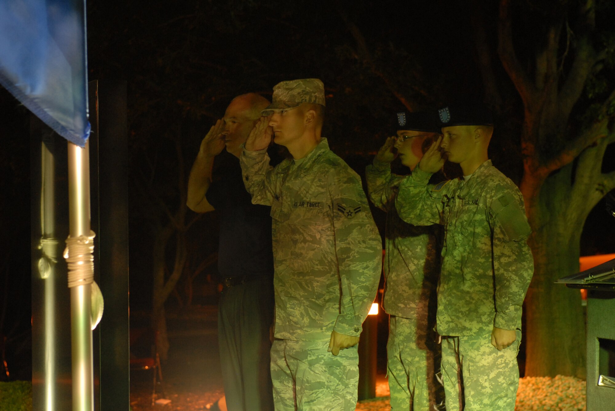 GOODFELLOW AIR FORCE BASE, Texas -- Team Goodfellow members render a salute to prisoners of war and servicemembers missing in action during the POW/MIA ceremony, Sept. 18, 2009. Base personnel stood a 24-hour vigil honoring POWs and MIAs. (U.S. Air Force photo/Staff Sgt. Laura R. McFarlane)