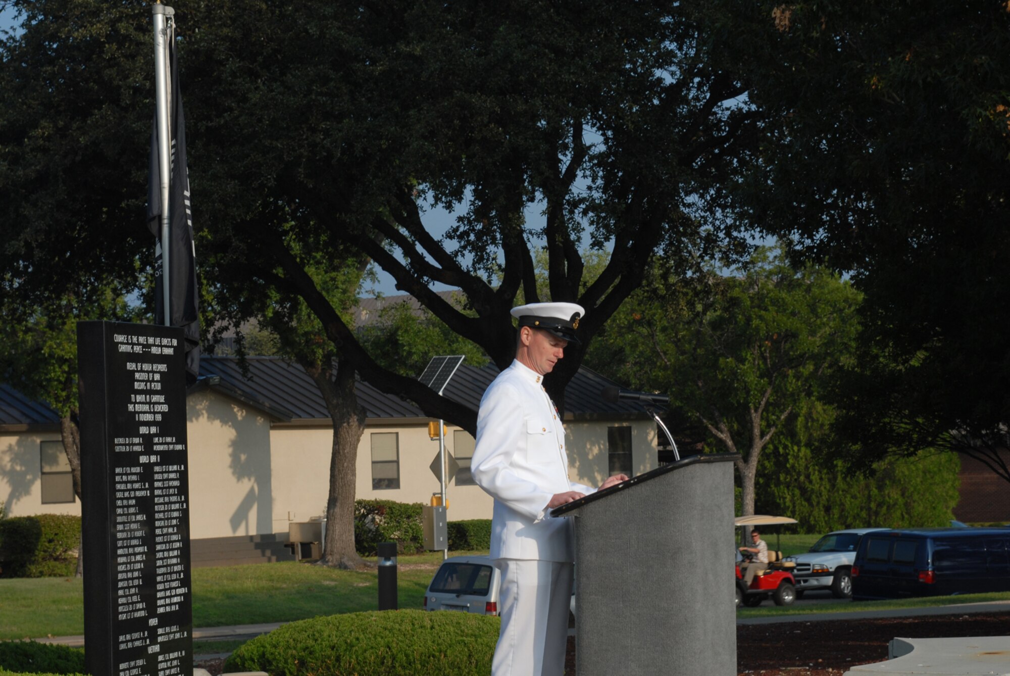 GOODFELLOW AIR FORCE BASE, Texas -- Navy Master Chief Petty Officer Paul Zimmerman, Center for Information Dominance Detachment, reads the name of a Sailor still missing in action during the Prisoner of War/Missing in Action ceremony Sept. 18, 2009. Base personnel stood a 24-hour vigil honoring POWs and MIAs. (U.S. Air Force photo/Staff Sgt. Laura R. McFarlane)