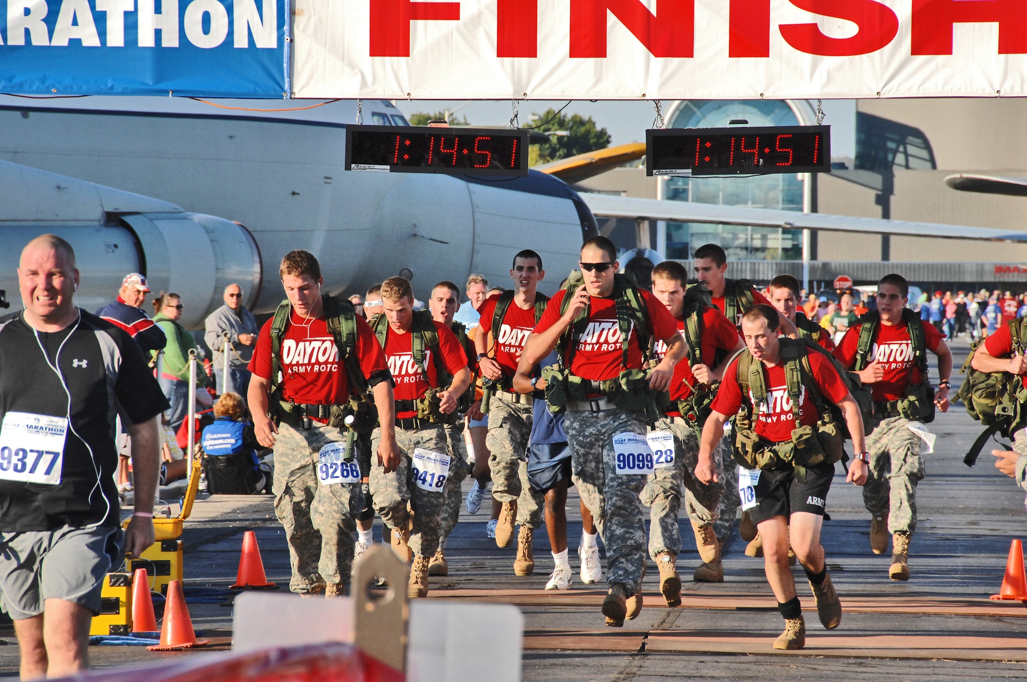 Army ROTC members from the University of Dayton ran the 10K race wearing boots and backpacks Sept. 19, 2009 during the U.S. Air Force Marathon at Wright-Patterson AIr Force Base, Ohio. A record 9,969 runners participated in events which included a 5K, 10K, half marathon and marathon.  (Air Force photo/Ben Strasser)