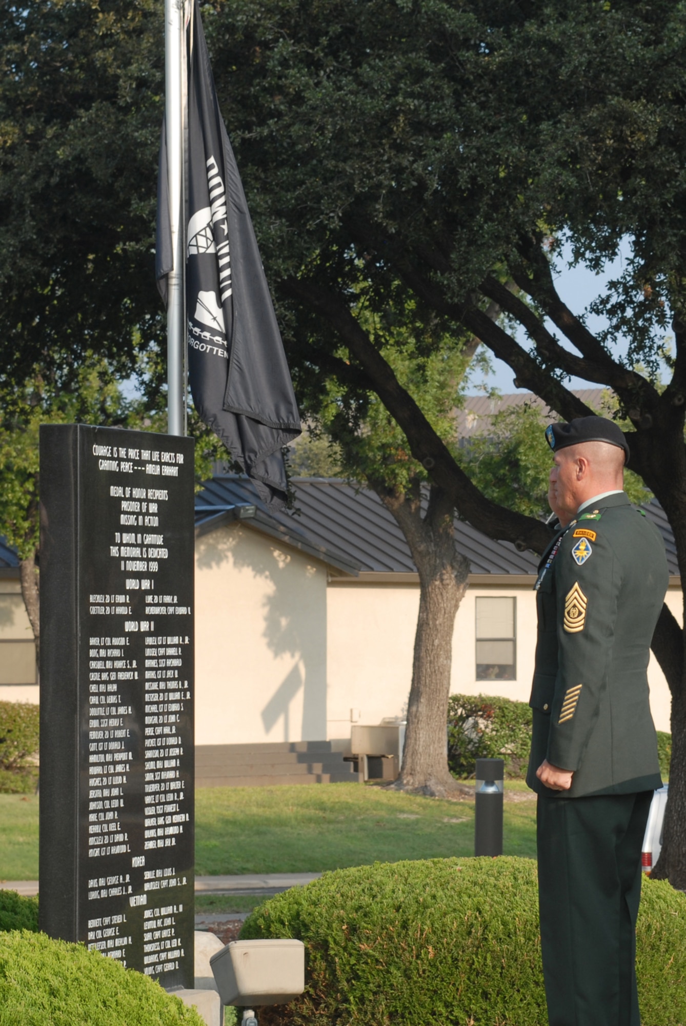 GOODFELLOW AIR FORCE BASE, Texas -- Army Command Sgt. Maj. Dan McCraw, 344th Military Intelligence Battalion, renders a salute to prisoners of war and those missing in action during the POW/MIA ceremony, Sept. 18, 2009. Base personnel stood a 24-hour vigil honoring POWs and MIAs. (U.S. Air Force photo/Staff Sgt. Laura R. McFarlane)