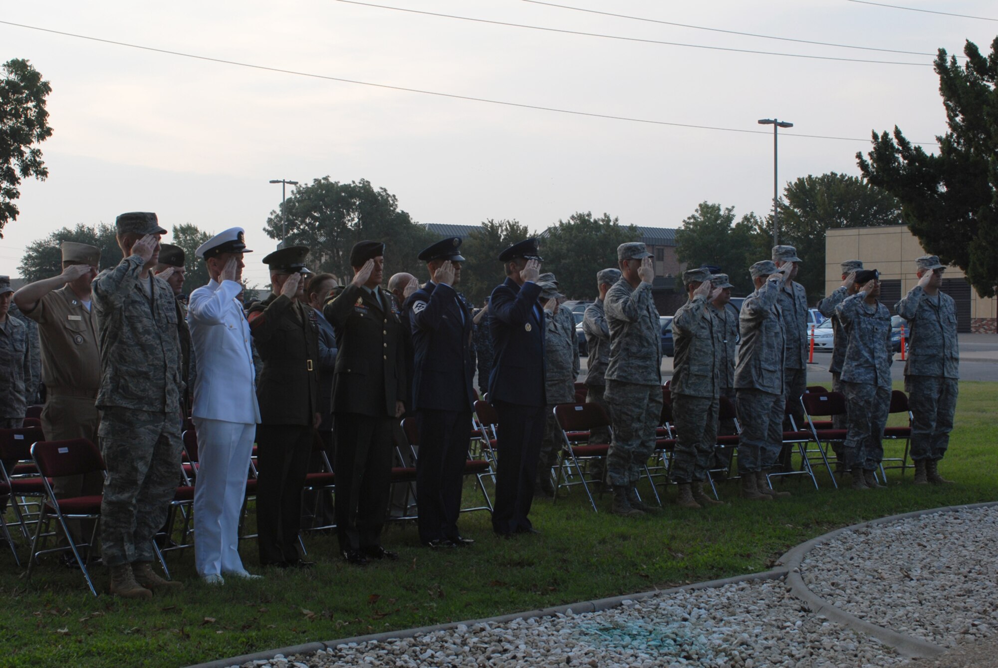 GOODFELLOW AIR FORCE BASE, Texas -- Team Goodfellow leadership renders a salute for the playing of the national anthem during the Prison of War/Missing in Action ceremony, Sept. 18, 2009. Base personnel stood a 24-hour vigil honoring POWs and MIAs. (U.S. Air Force photo/Staff Sgt. Laura R. McFarlane)