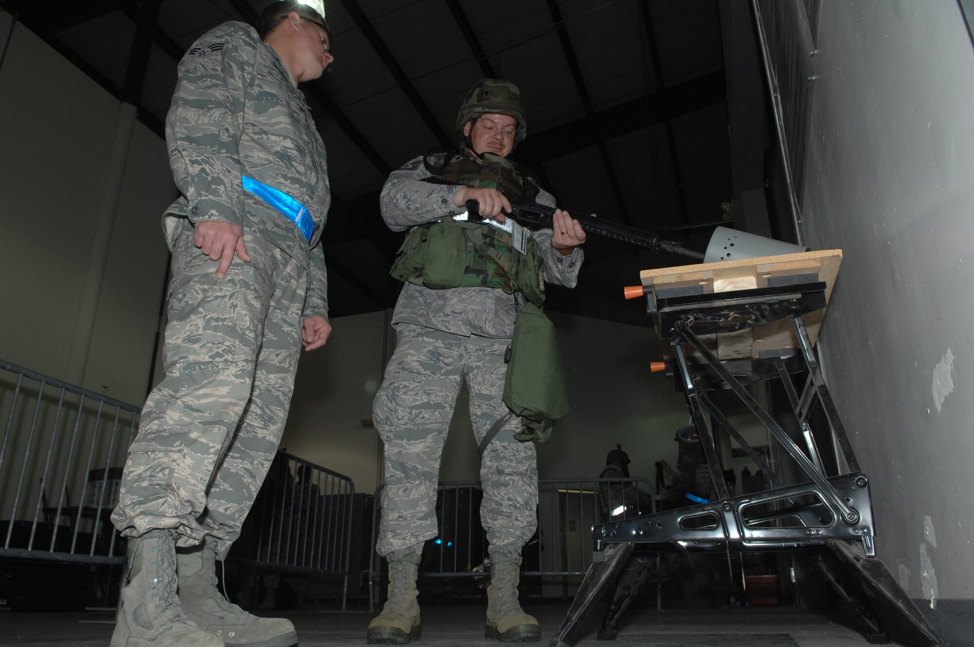 WHITEMAN AIR FORCE BASE, Mo. – Tech. Sgt. Shawn Johnson, 442nd Civil Engineer Squadron, clears his weapon during the Phase II exercise, Sept. 16.  Phase II exercise is an annual mobility exercise, which inspects all areas of 442nd operations.