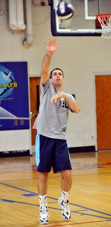 Scott Saffran makes a serve during a volleyball game between the 437th Operations Group Flyers and 437th Maintenance Squadron at the Fitness and Sports Center here Sept. 22. The 437 OG defeated the 437 MXS 2-0. Saffran is a pilot with the 14th Airlift Squadron.