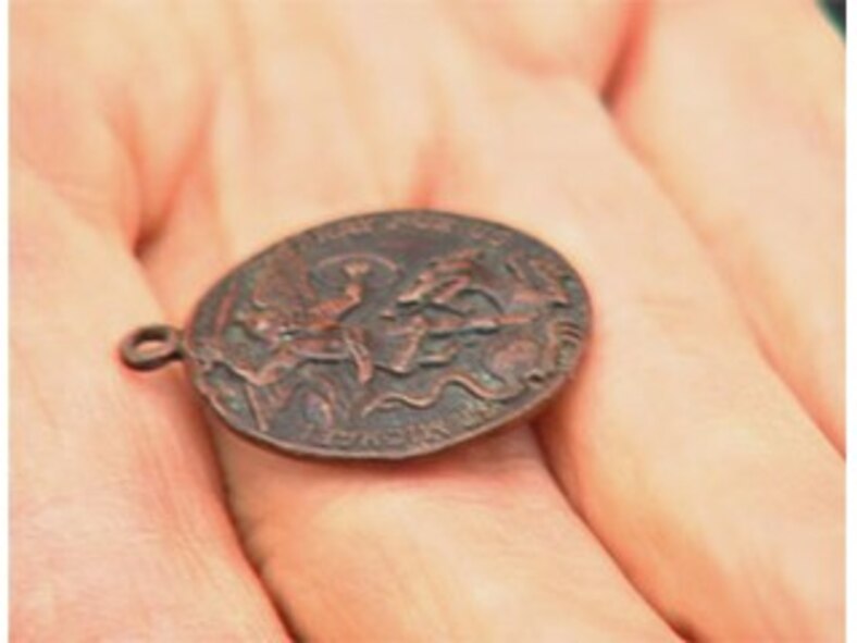 HANSCOM AIR FORCE BASE, Mass. - Barbara O'Connor keeps this medal of Saint Michael in her purse. Her husband was wearing it when he disappeared while serving in Vietnam. (Photo courtesy of WBZTV.com)